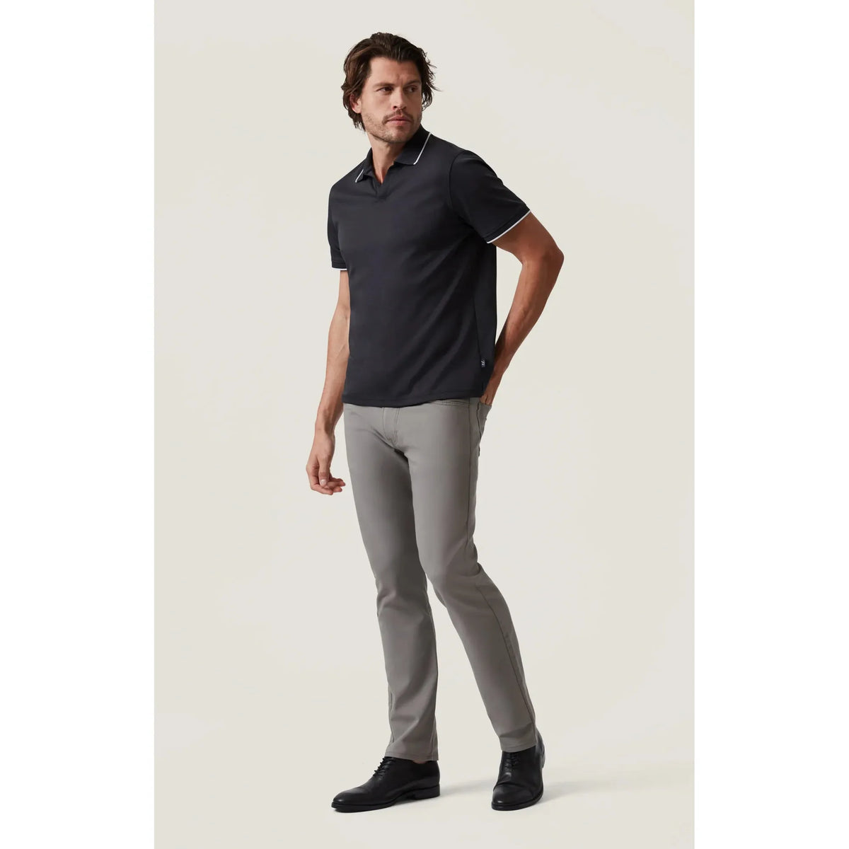 Elevate your style with the 34 Heritage Riviera Polo featuring elegant white lining for any occasion.