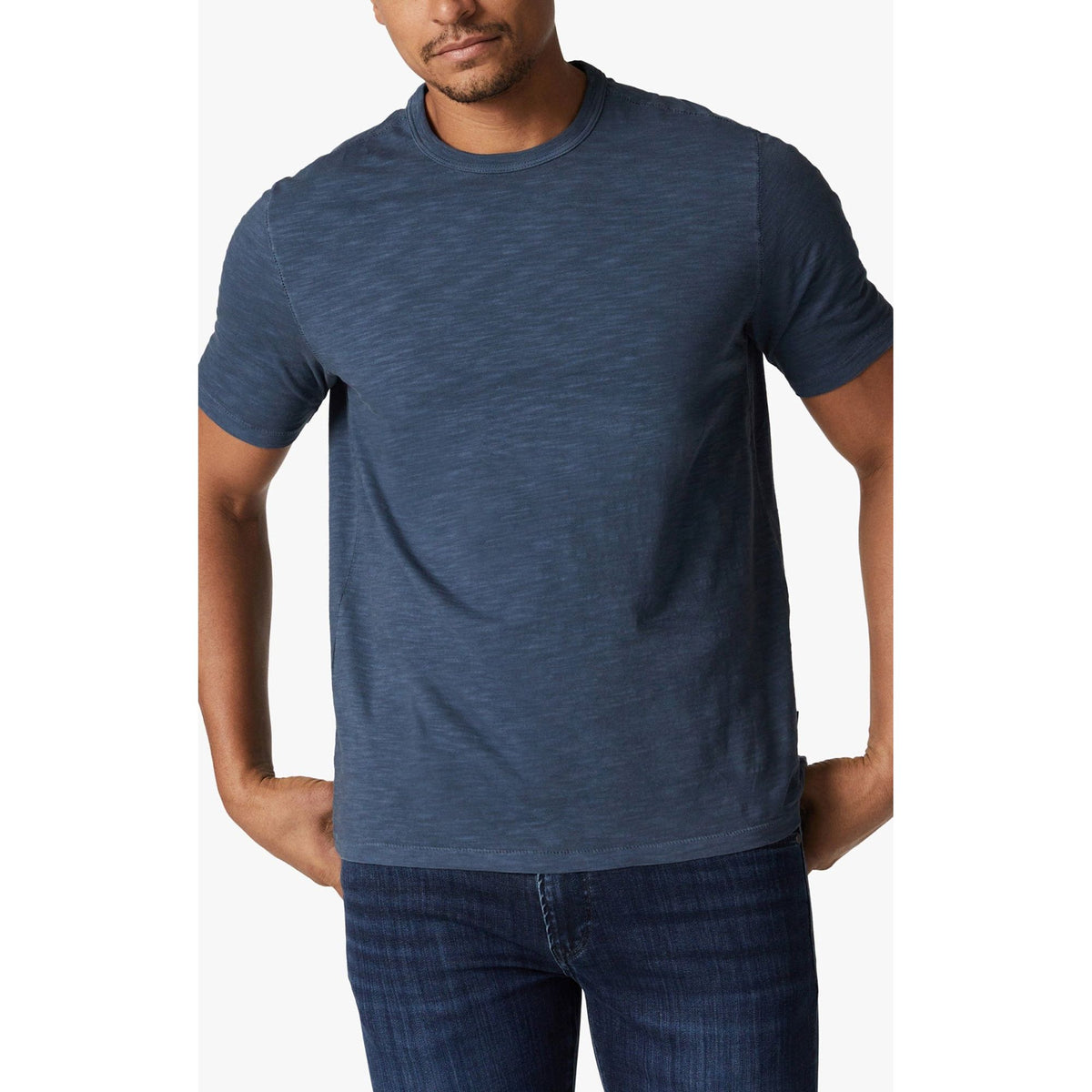 Man wearing blue 34 Heritage Slub Crew Tshirt in lightweight cotton-jersey crewneck.
