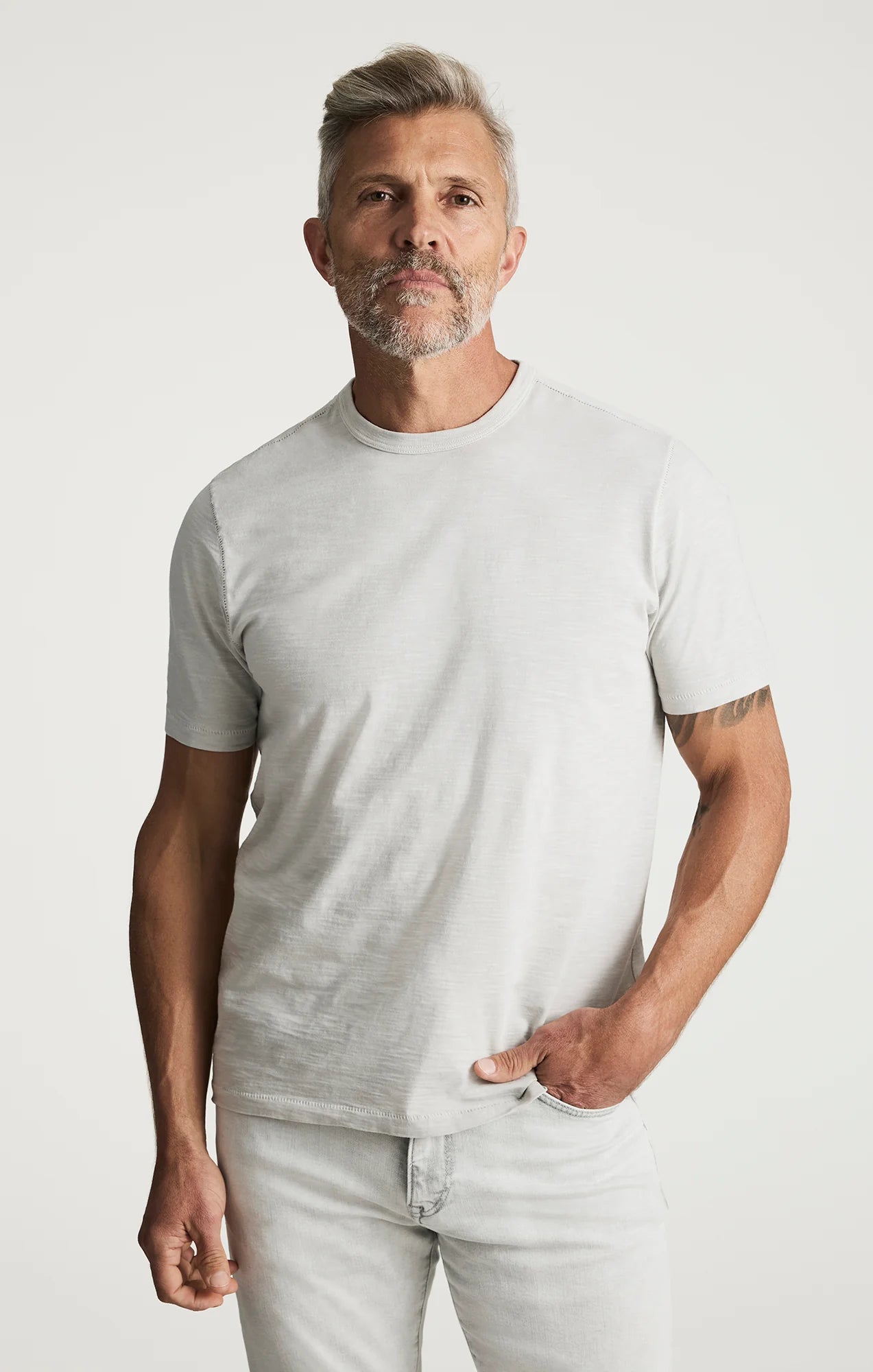34 Heritage Slub Crew Tshirt in soft pink on a male model; lightweight slub cotton-jersey, 100% BCI cotton.
