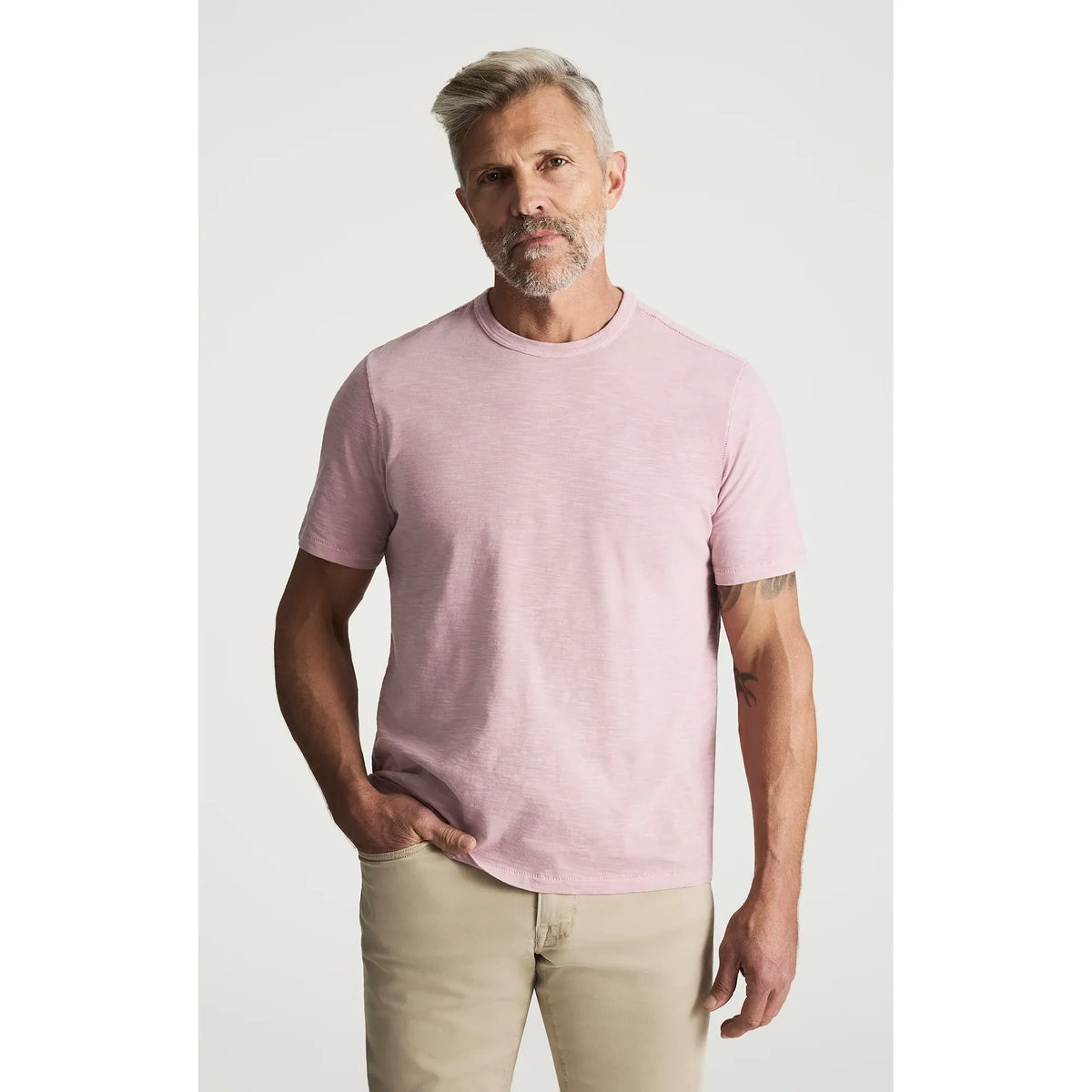 34 Heritage Slub Crew Tshirt in soft pink on a male model; lightweight slub cotton-jersey, 100% BCI cotton.
