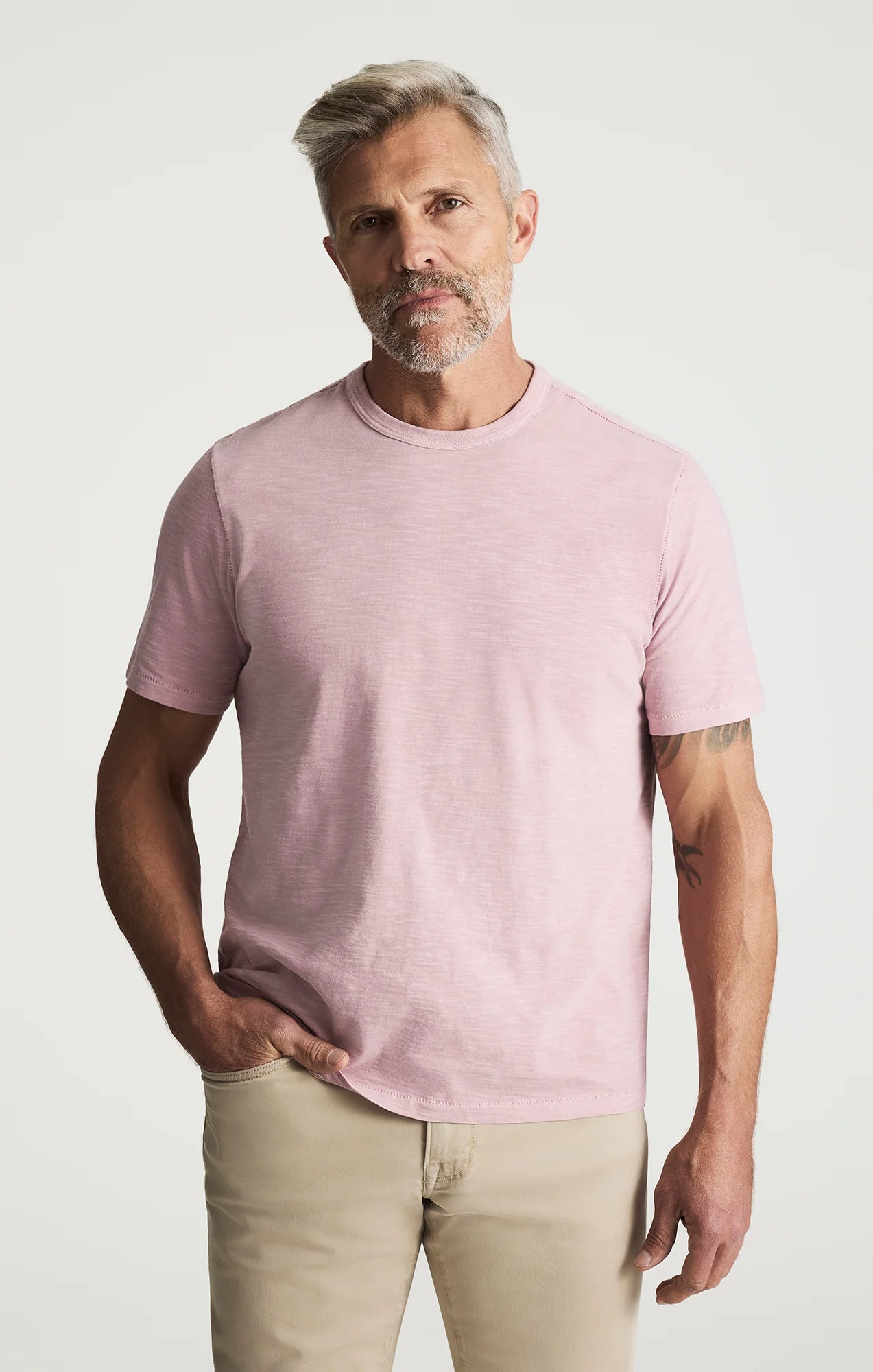 34 Heritage Slub Crew Tshirt in soft pink on a male model; lightweight slub cotton-jersey, 100% BCI cotton.