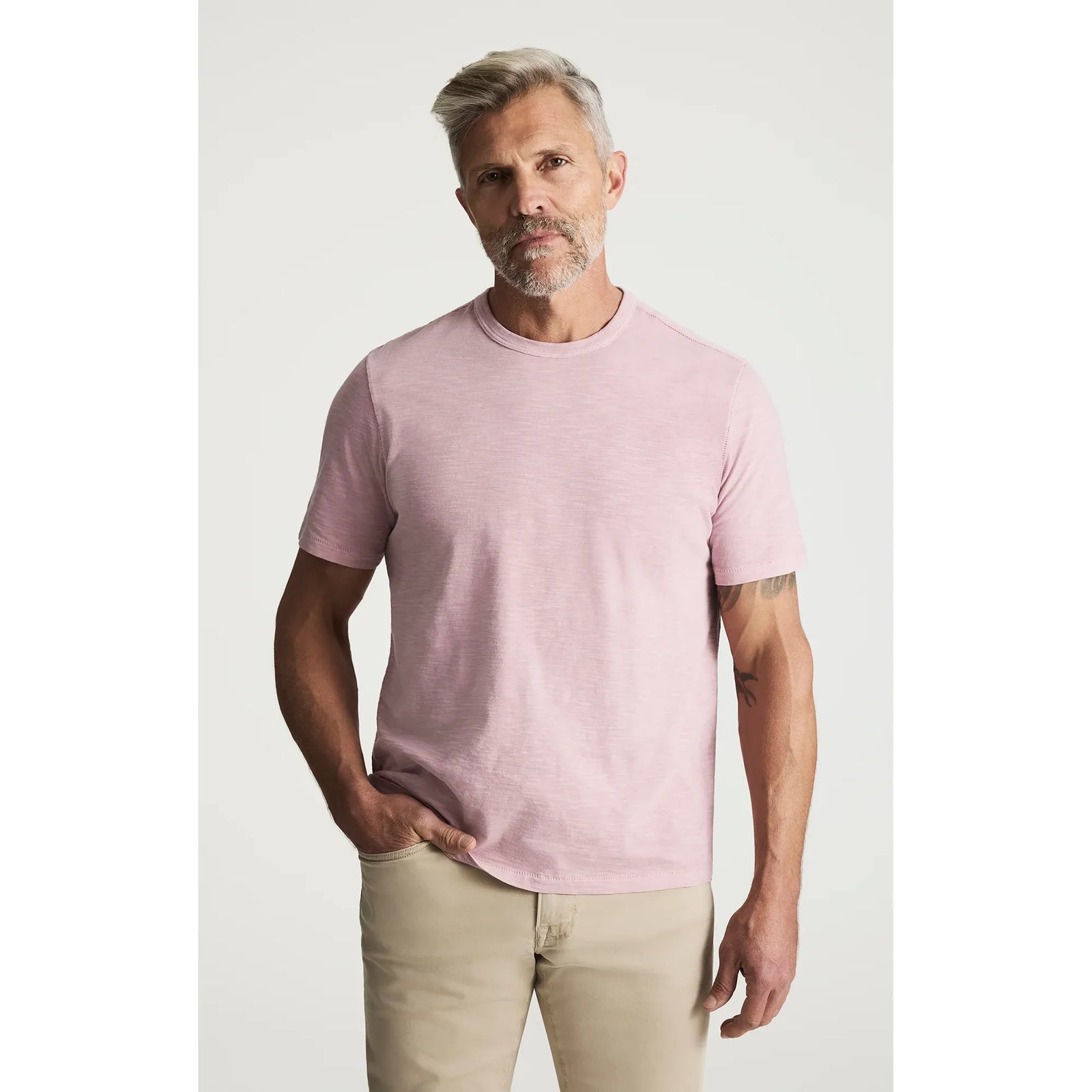 34 Heritage Slub Crew Tshirt in soft pink on a male model; lightweight slub cotton-jersey, 100% BCI cotton.