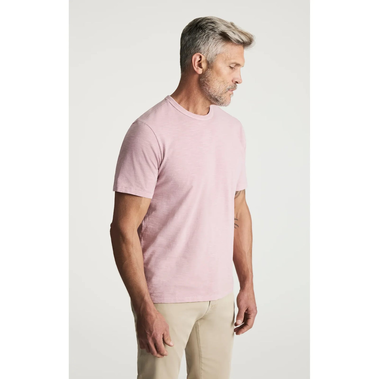 Man wearing pale pink 34 Heritage Slub Crew Tshirt, 100% BCI cotton, relaxed fit.