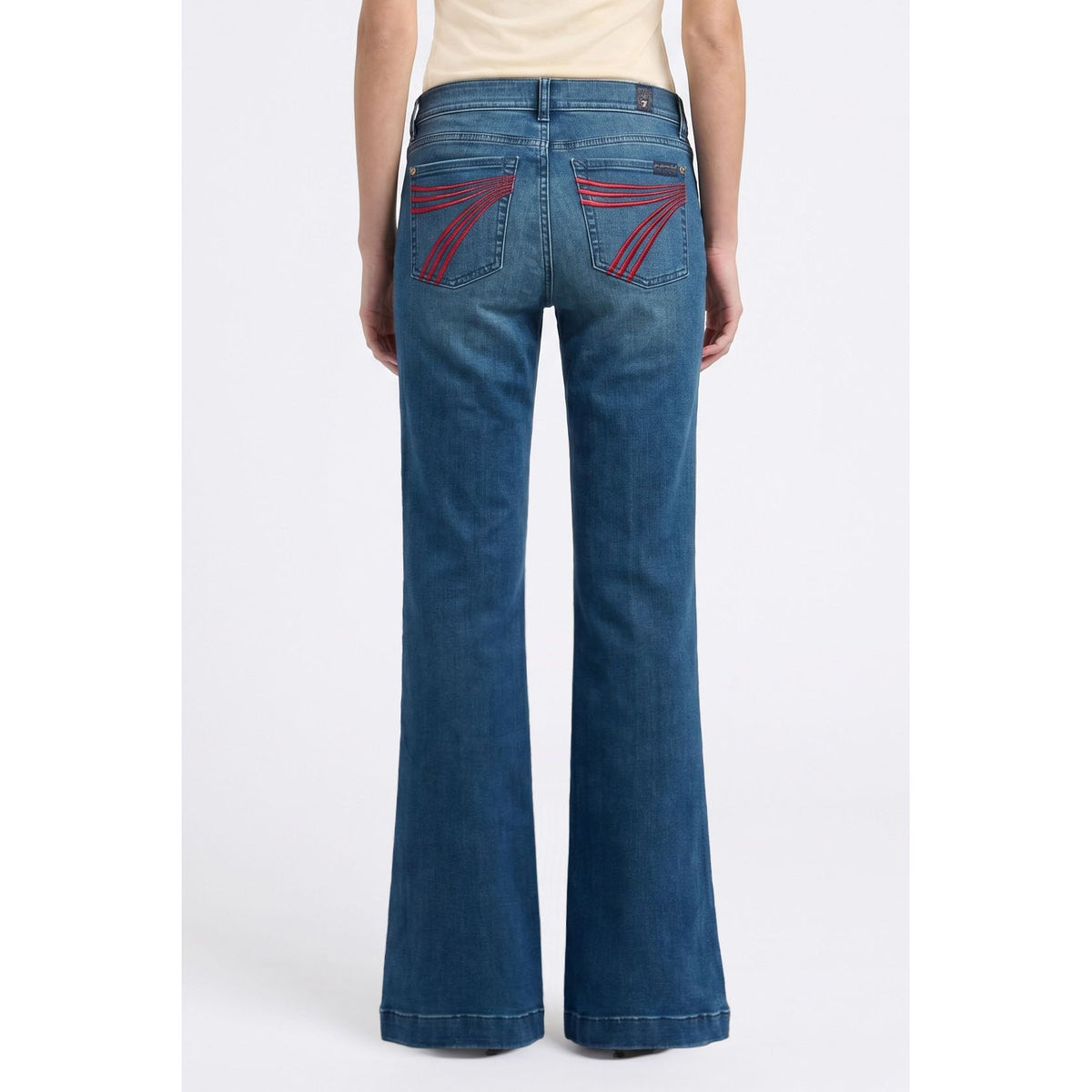7 for all Mankind Dojo in Coreflow jeans, mid-rise flare with red stitched back pockets, back view.