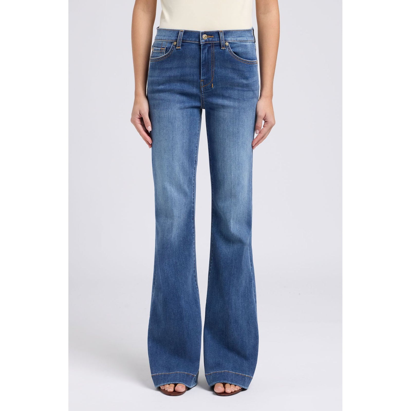 7 for all Mankind Dojo in Gale jeans, mid-rise flare contours waist and hips into a long, subtle silhouette.