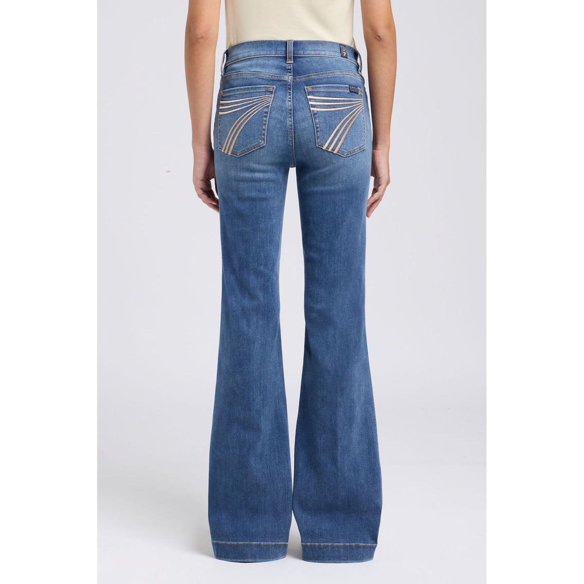 7 for all Mankind Dojo in Gale, back view mid-rise flare jeans with curved back-pocket embroidery.