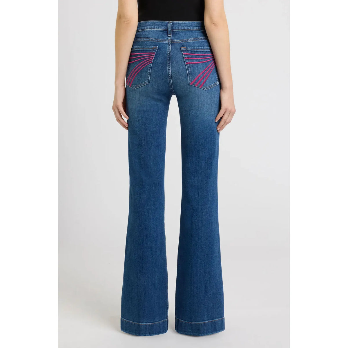 7 for all Mankind Dojo in Moonwater, back view with pink stitched pocket detailing and a mid-rise bootcut flare.