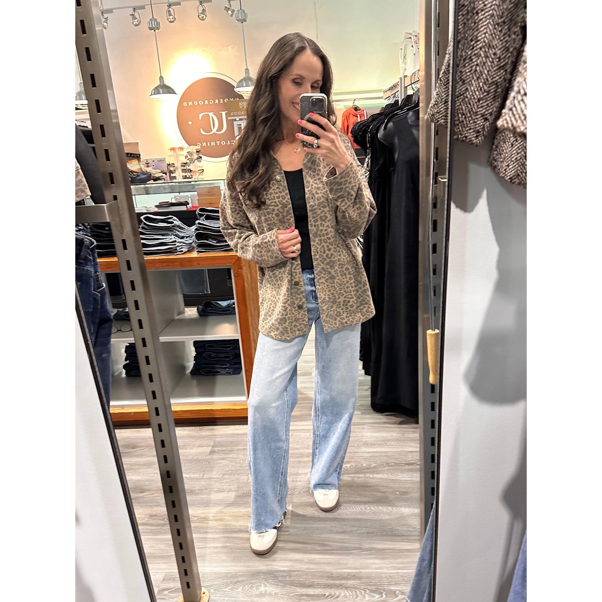 Z Supply All Day Knit Leopard Jacket worn by shopper in store mirror, leopard-print coat with buttoned front.