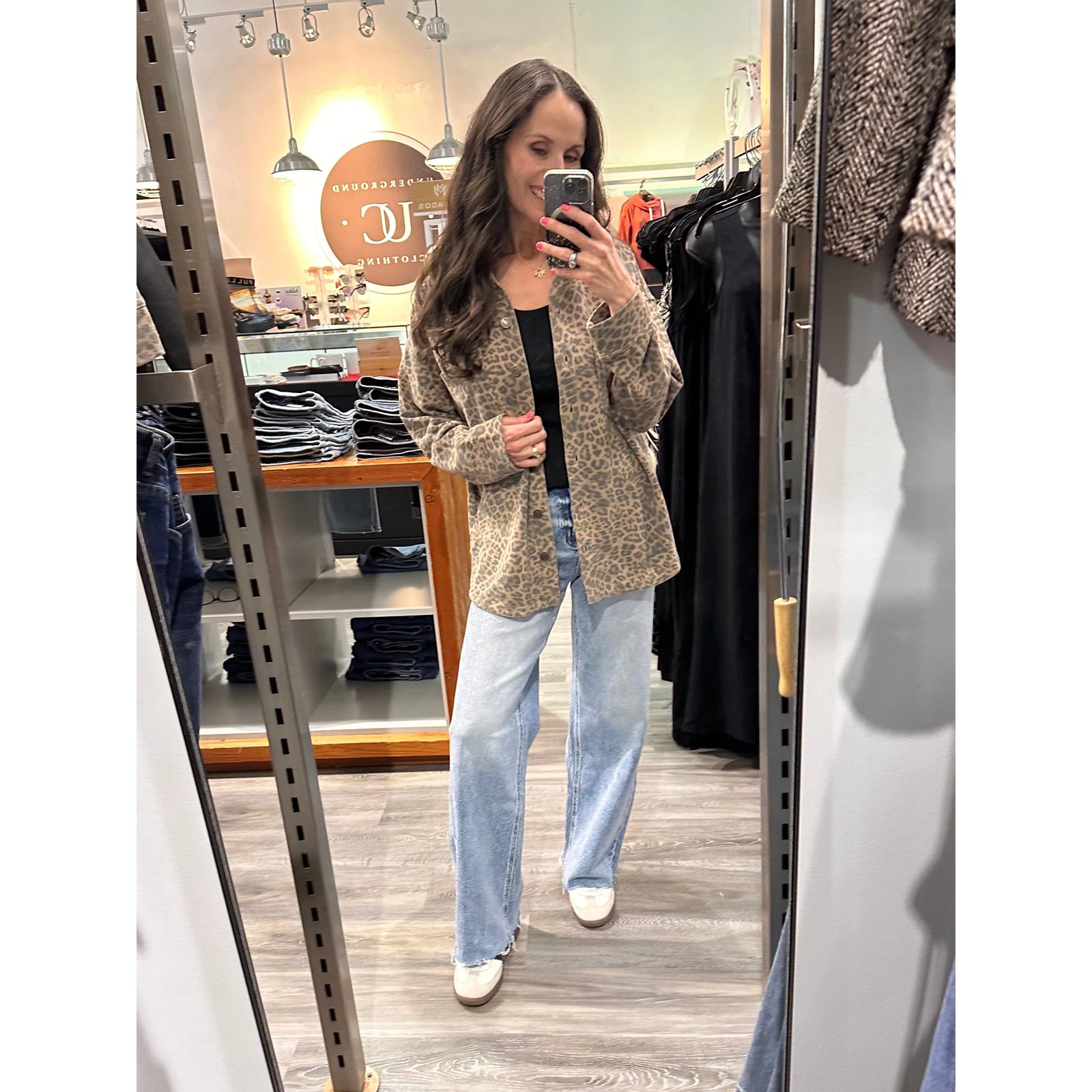 Z Supply All Day Knit Leopard Jacket worn by shopper in store mirror, leopard-print coat with buttoned front.