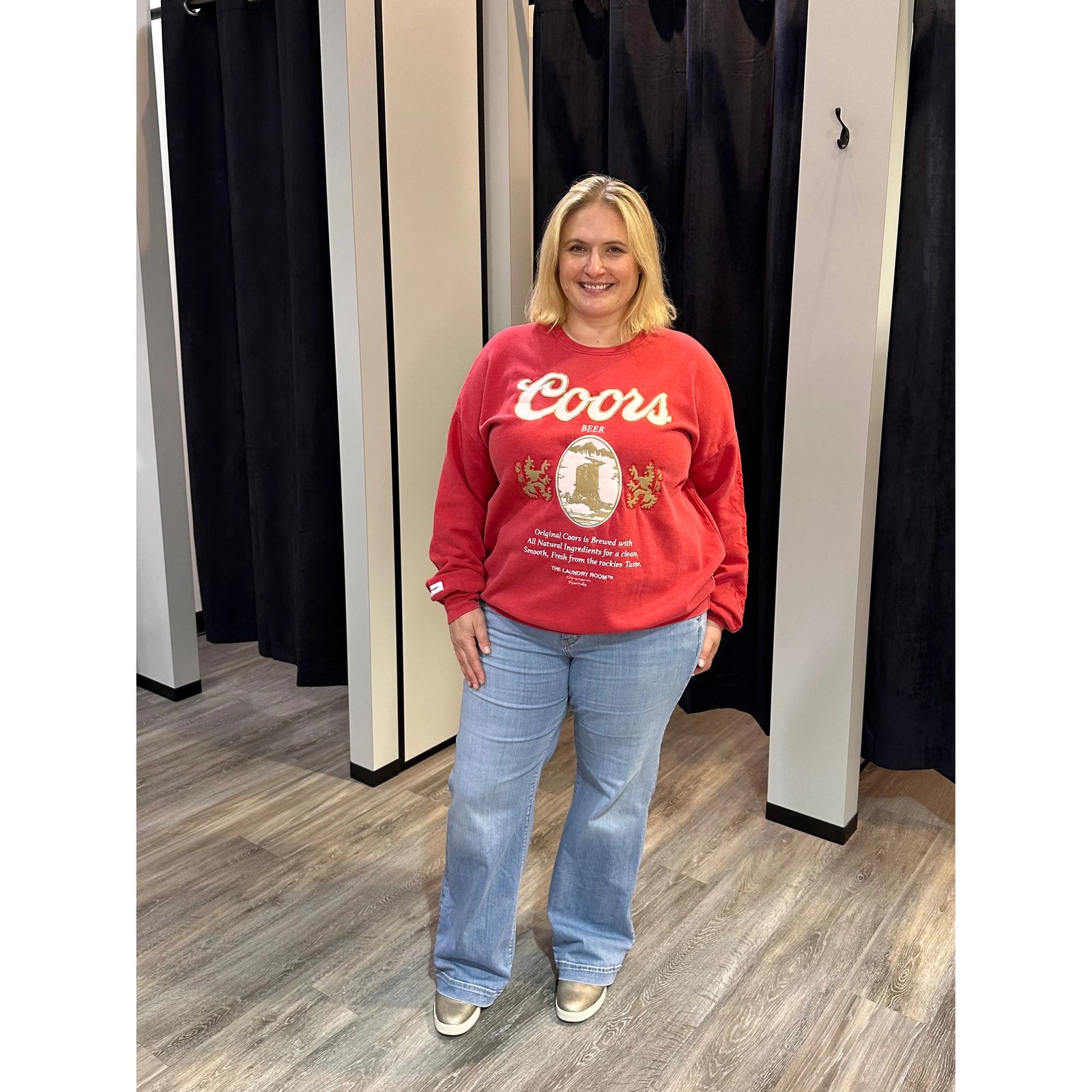 Red sweatshirt with Coors Beer logo on a white background