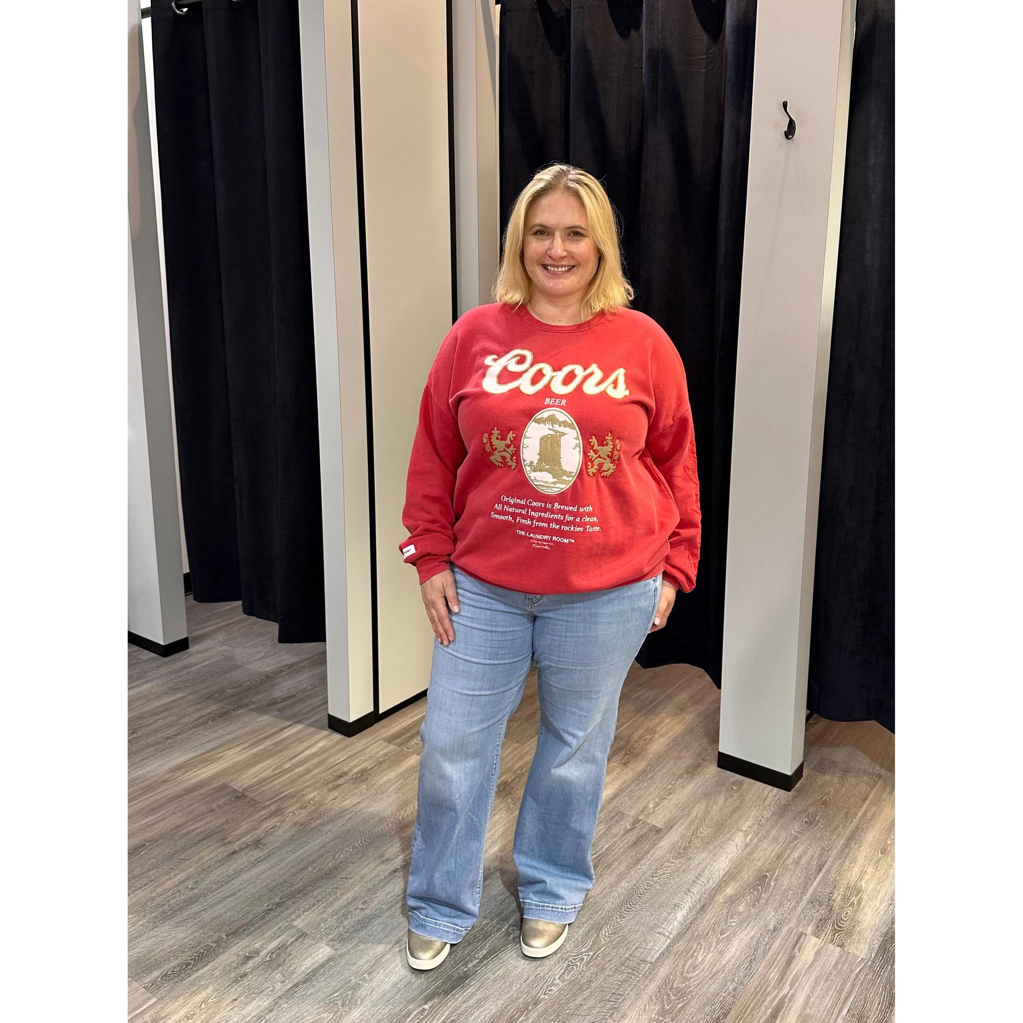 Red sweatshirt with Coors Beer logo on a white background