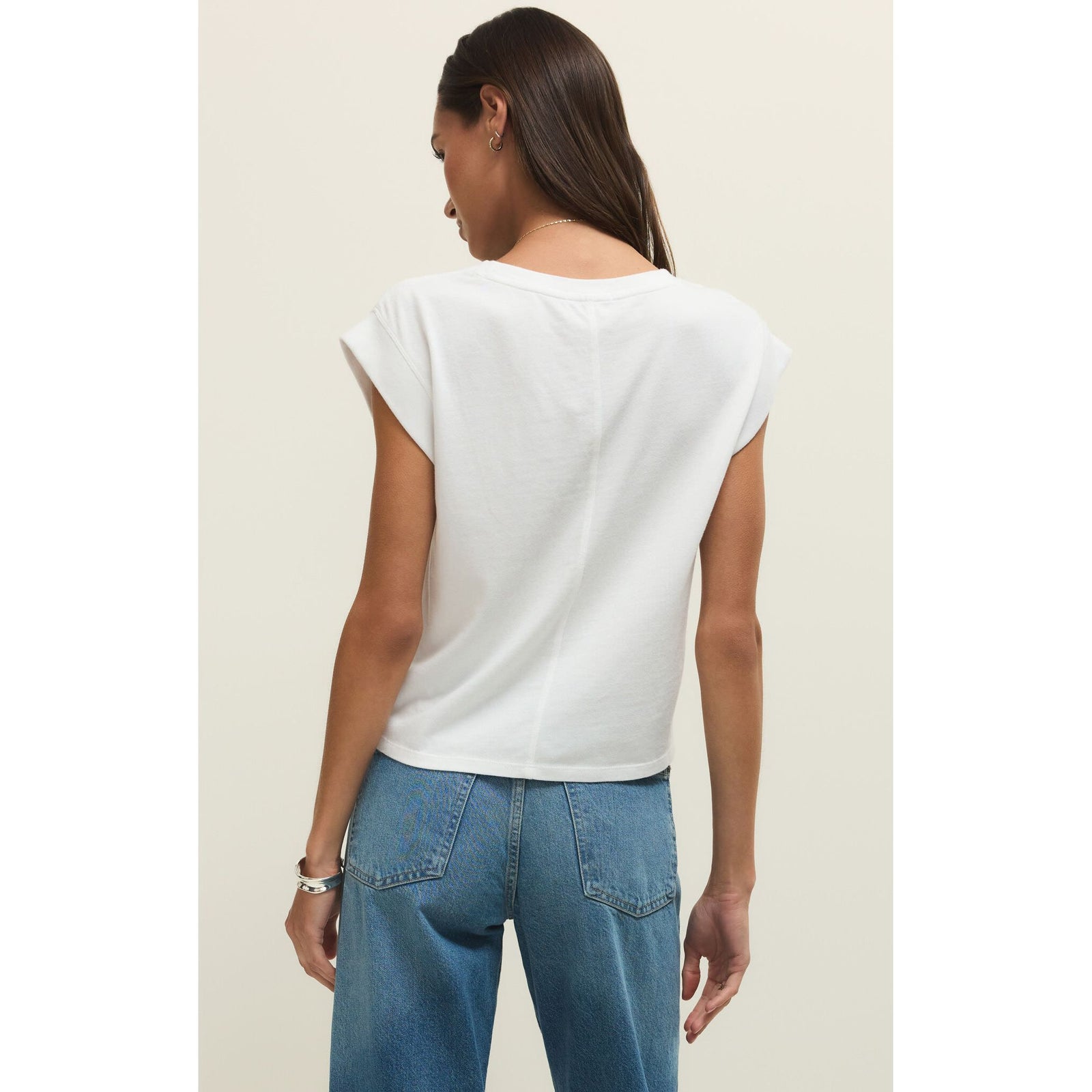 Z Supply Camino Jersey Top: white relaxed crewneck tee with statement sleeves on a model in jeans.