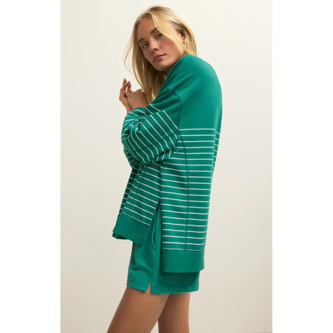 Z Supply Modern Weekender Stripe Sweatshirt in teal with white stripes, relaxed fit on model