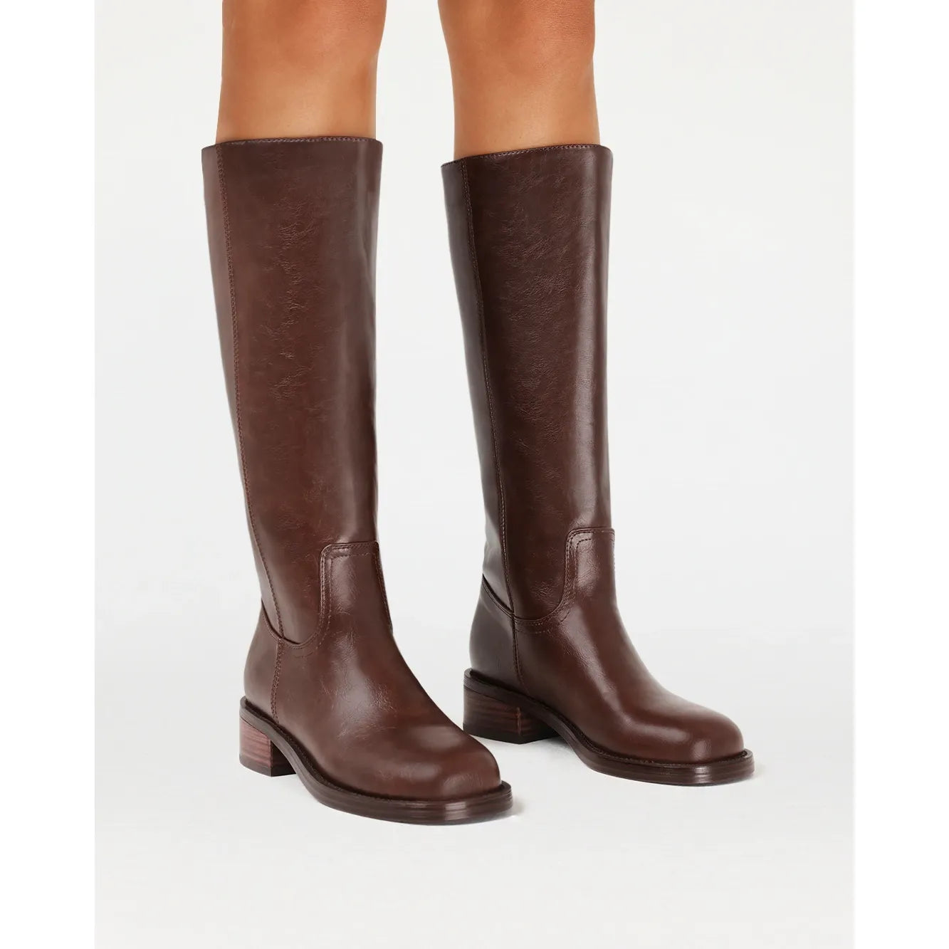 Brown Billini Jamison knee-high boots with a structured shaft and low block heel, offering cool-weather elegance.