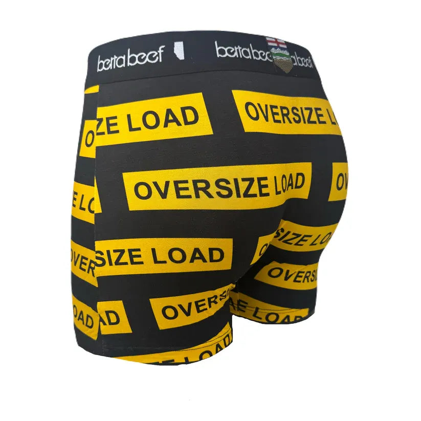 Berta Beef Oversize Load Boxer Brief in black with bold yellow OVERSIZE LOAD tape print and branded waistband.