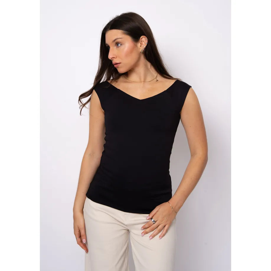 Woman wearing Bovia 23 Off Shoulder Top in black, sleeveless with off-shoulder neckline in second skin fabric.
