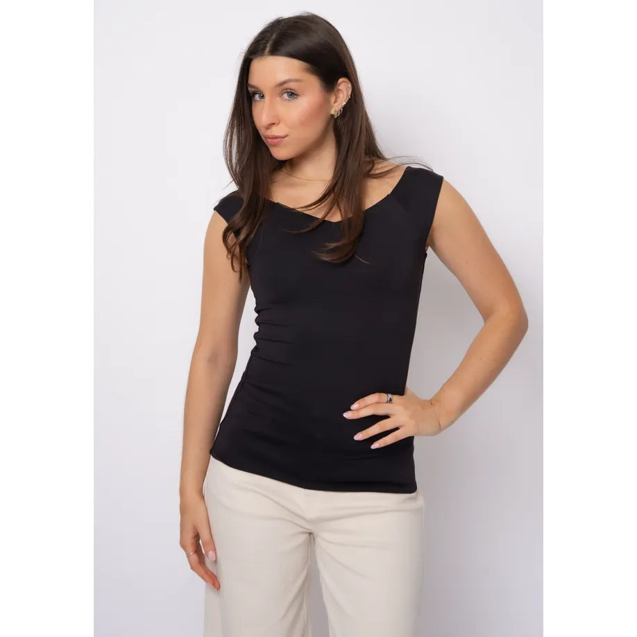 Woman wearing Bovia 23 Off Shoulder Top in black, sleeveless with off-shoulder neckline in second skin fabric.