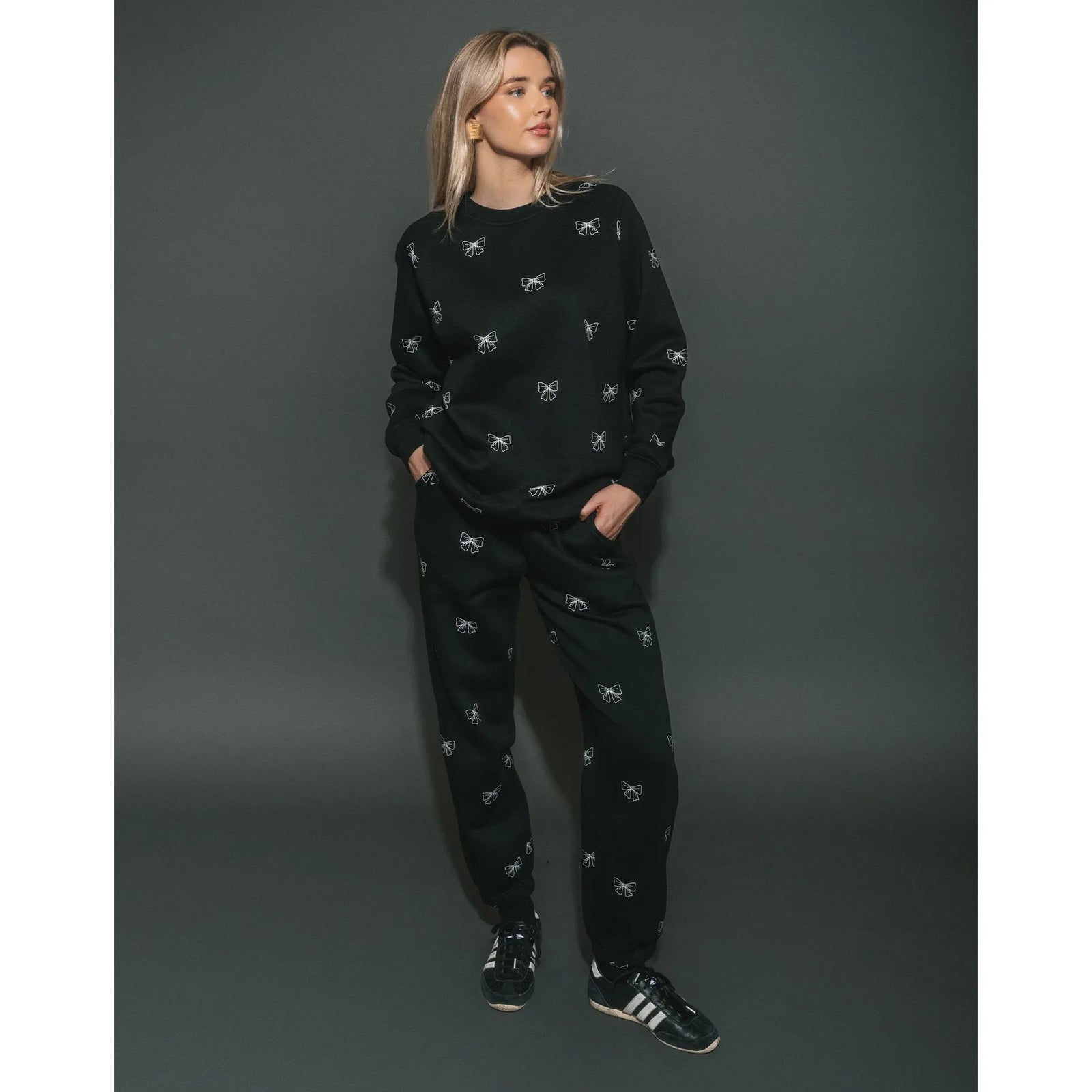 Brunette the Label oversized black Bow print Big Sister Crew with raglan sleeves and matching joggers on model.