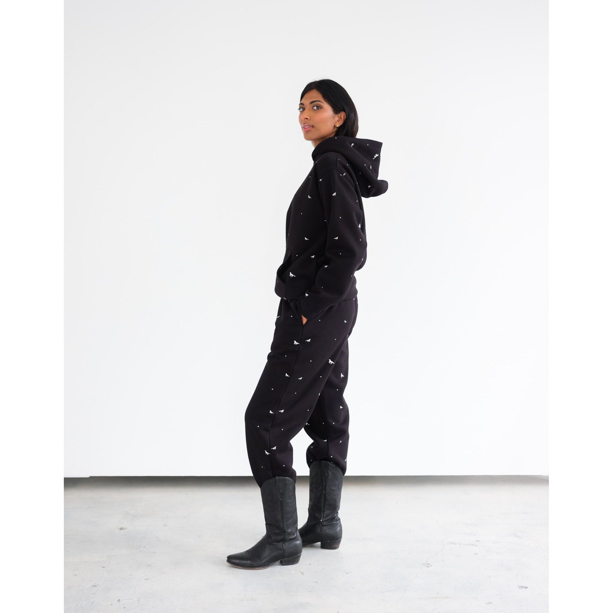 Brunette the Label All Over Horse Hoodie with an all-over horse print and relaxed fit, worn by a model.