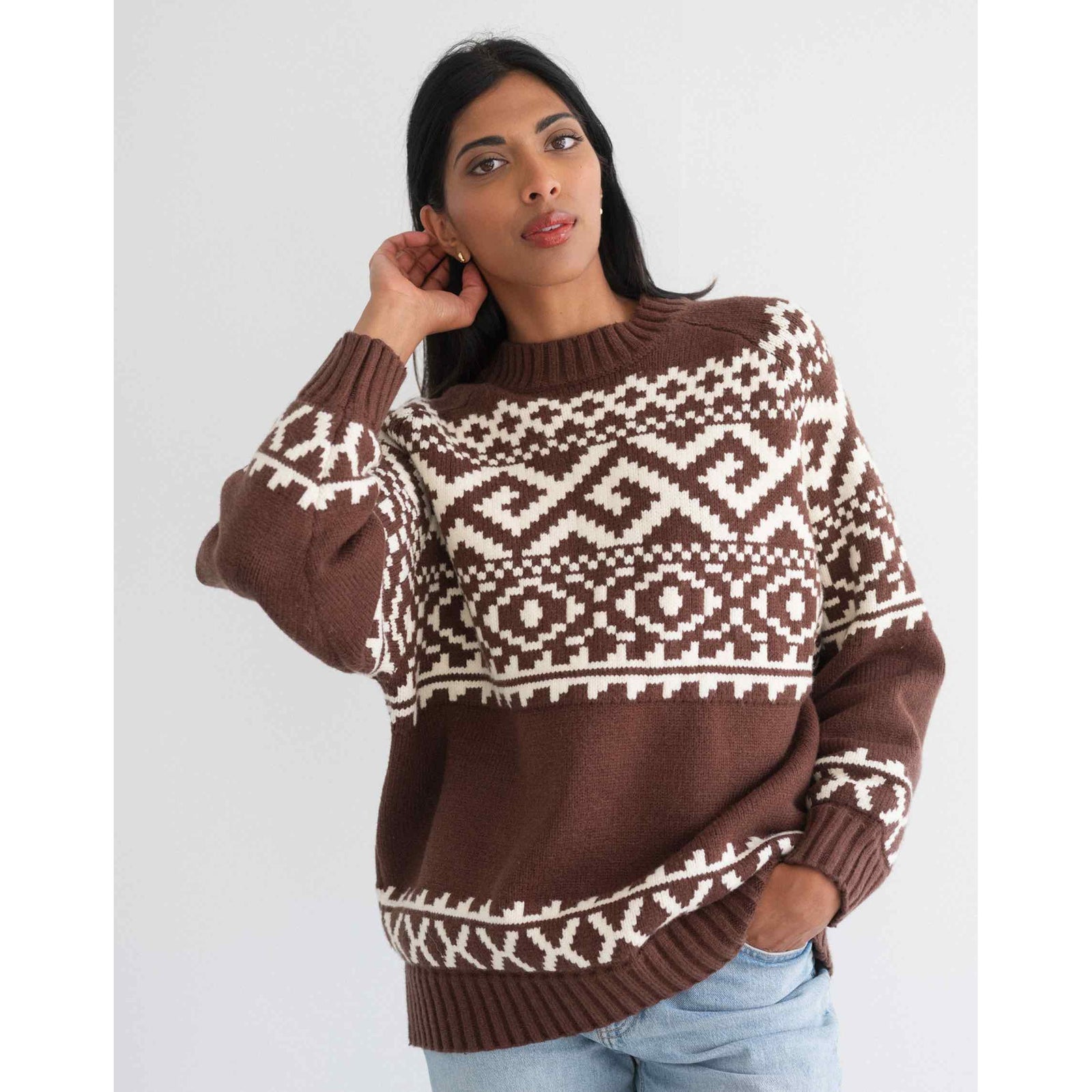 Brunette the Label Fair Isle Sweater on model, oversized brown knit with white geometric pattern and drop-shoulder.