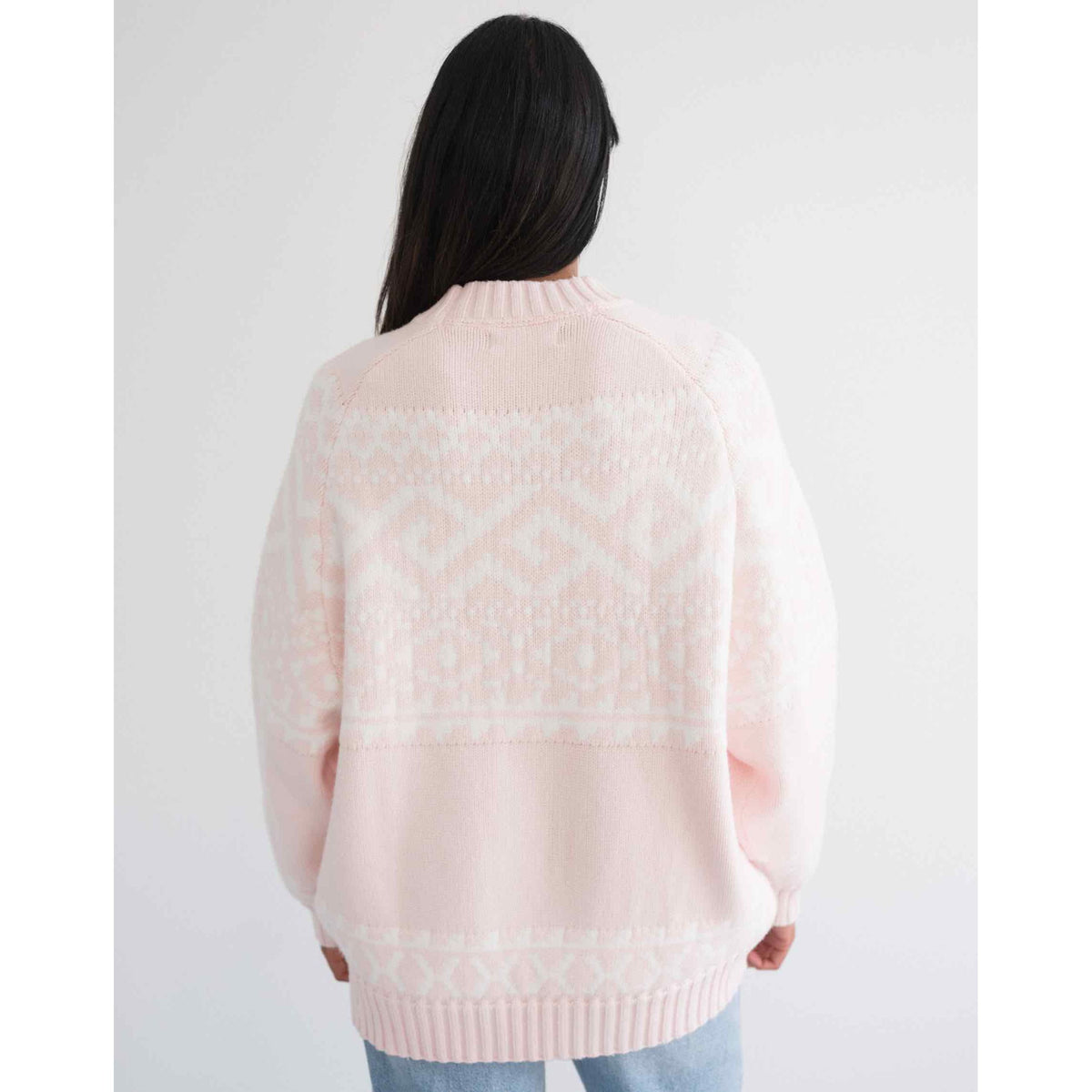 Brunette the Label Fair Isle Sweater in blush pink, oversized knit with drop shoulders, back view.