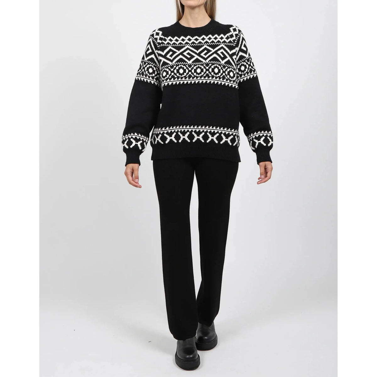 Brunette the Label Fair Isle Sweater in black with white geometric pattern; oversized, drop-shoulder knit.