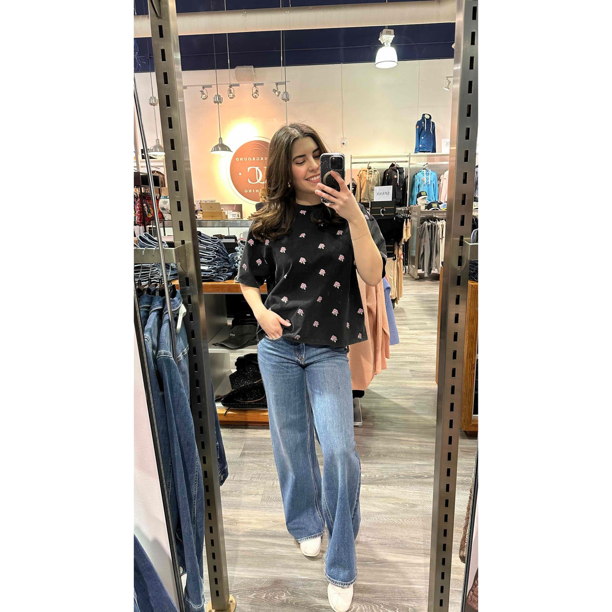 Brunette the Label Flower Boxy Tee showcases a stylish oversized fit with floral embroidery, perfect for spring outfits.