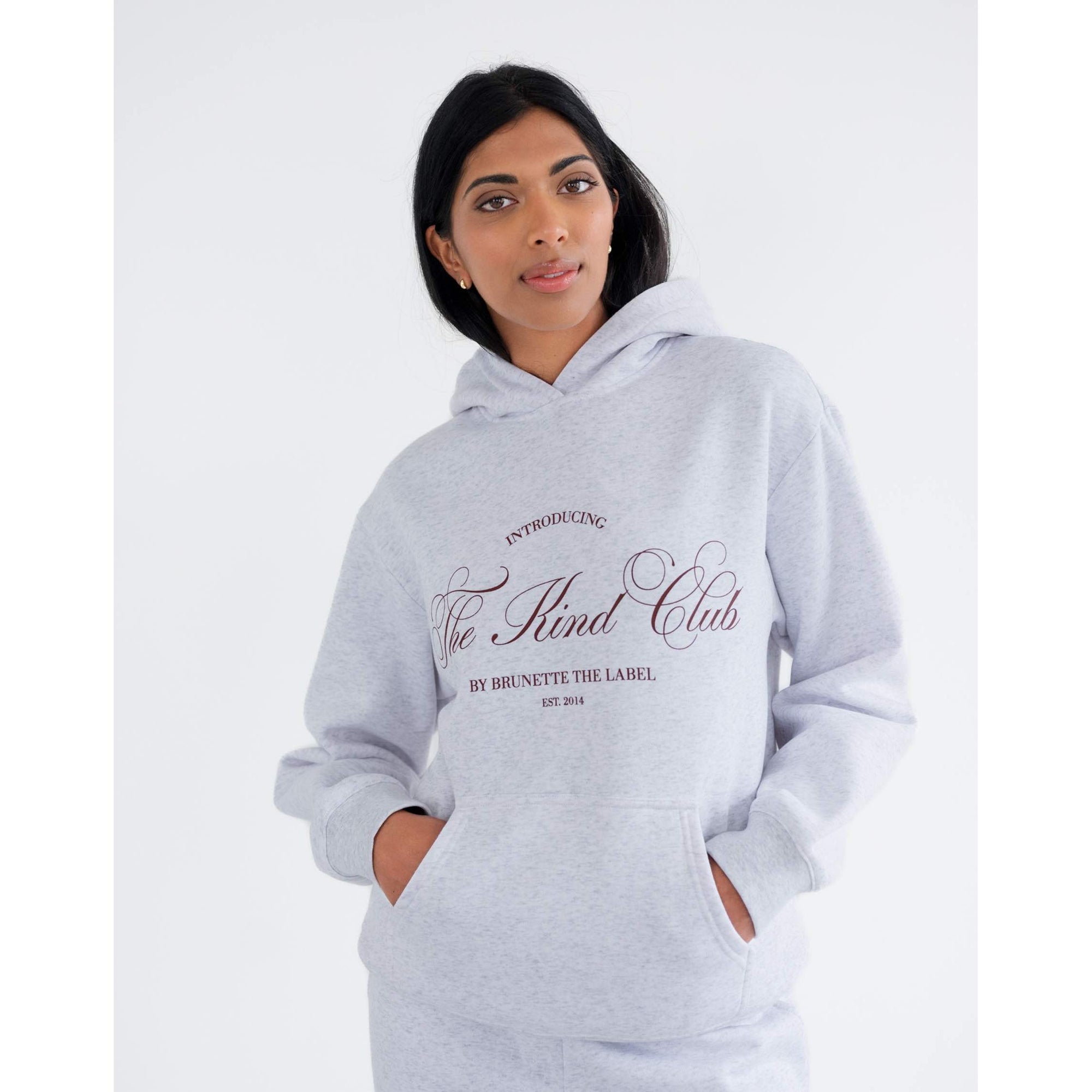 Brunette the Label Kind Club Core Hoodie in light gray with burgundy 'The Kind Club' script on the front.