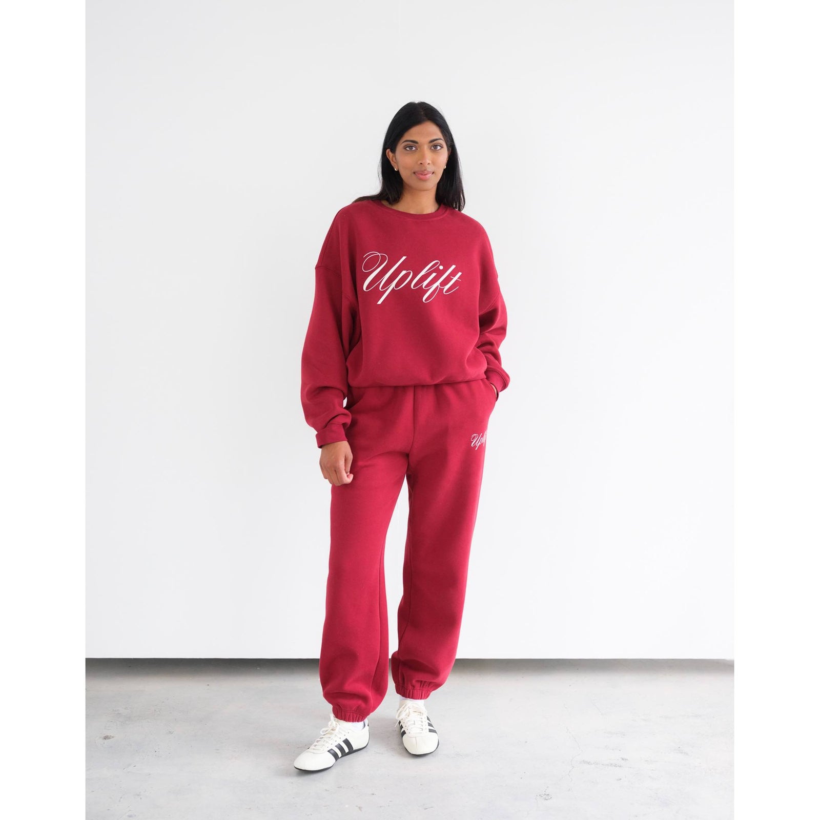 Brunette the Label Uplift Oversized Jogger burgundy with high-rise drawstring waist, wide legs and two side pockets.