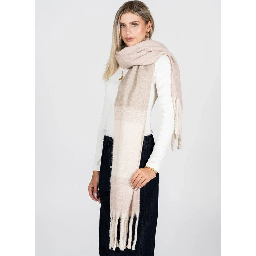 C'est Moi Checked Pattern Scarf in beige tones, 100% Polyester, draped on model with fringed ends.