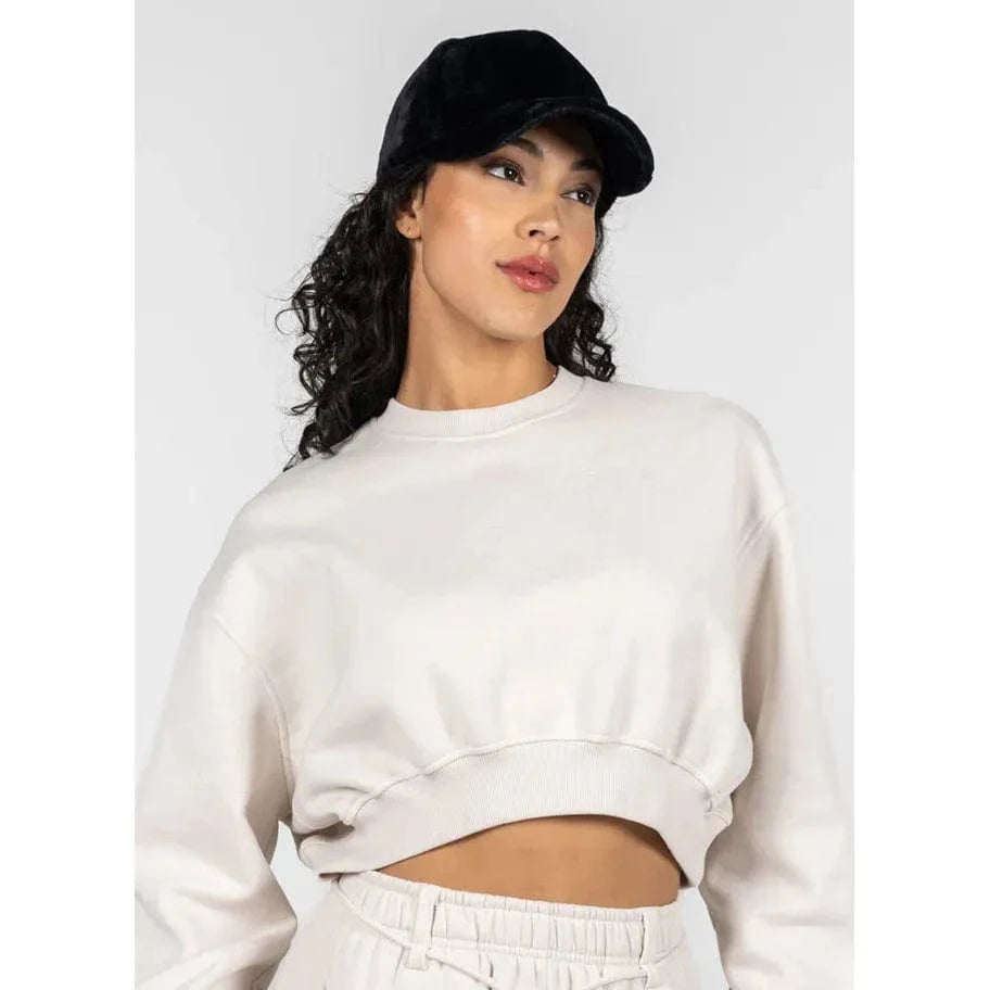 C'est Moi plush baseball hat in black with a soft, luxurious texture.