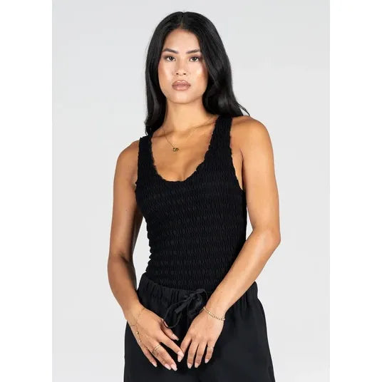 Black textured smocked V-neck tank with a contoured fit, made from soft rayon bamboo blend.
