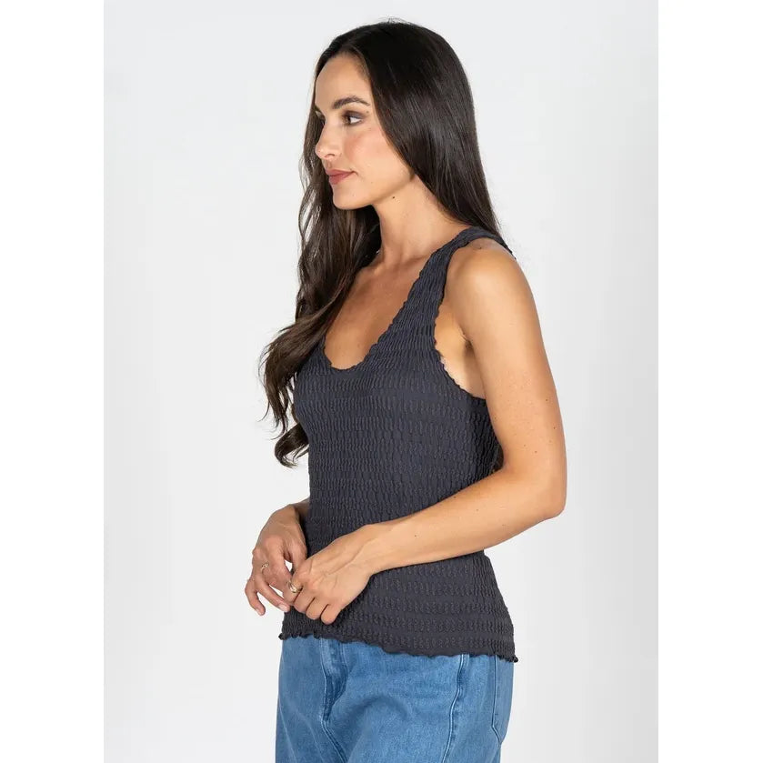 Textured dark grey smocked V-neck tank with contoured silhouette, made from soft bamboo rayon blend.