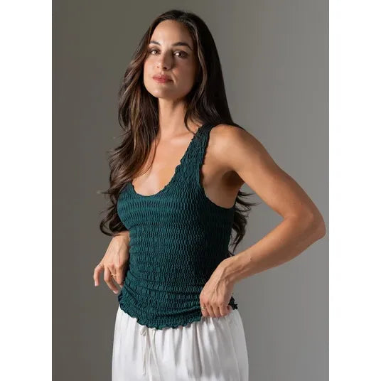 Teal smocked bamboo V-neck tank top with textured ruched fabric and contoured hip-length silhouette.