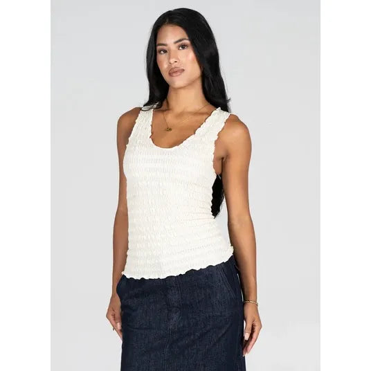 White textured smocked V-neck tank with contoured silhouette. Made from soft bamboo rayon blend. Hip-length tank top.
