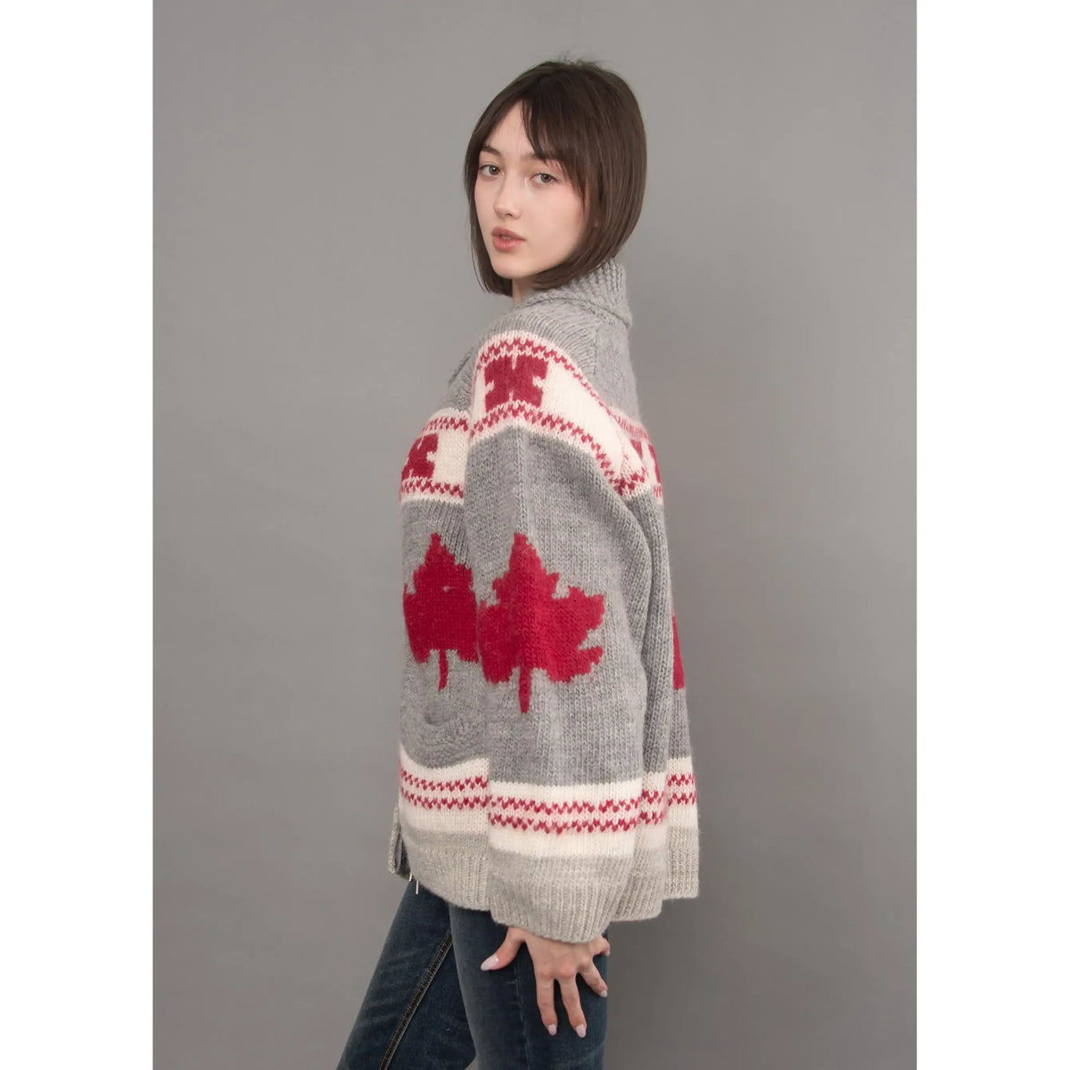 Grey knit daria raglan shawl collar sweater featuring red maple leaf motifs and white patterned bands.