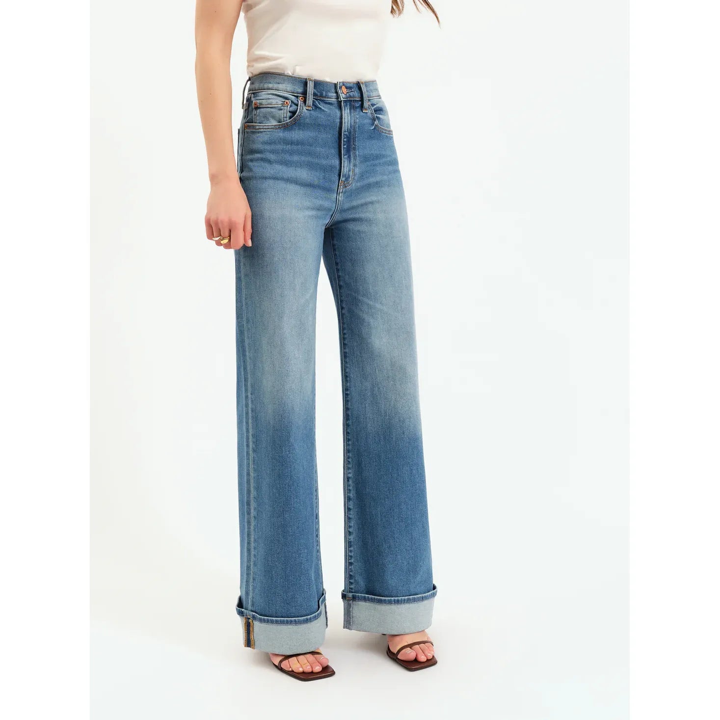 Daze Far Out High Rise Wide Leg jeans in Big Break with pre-rolled cuffs, on a model in denim.