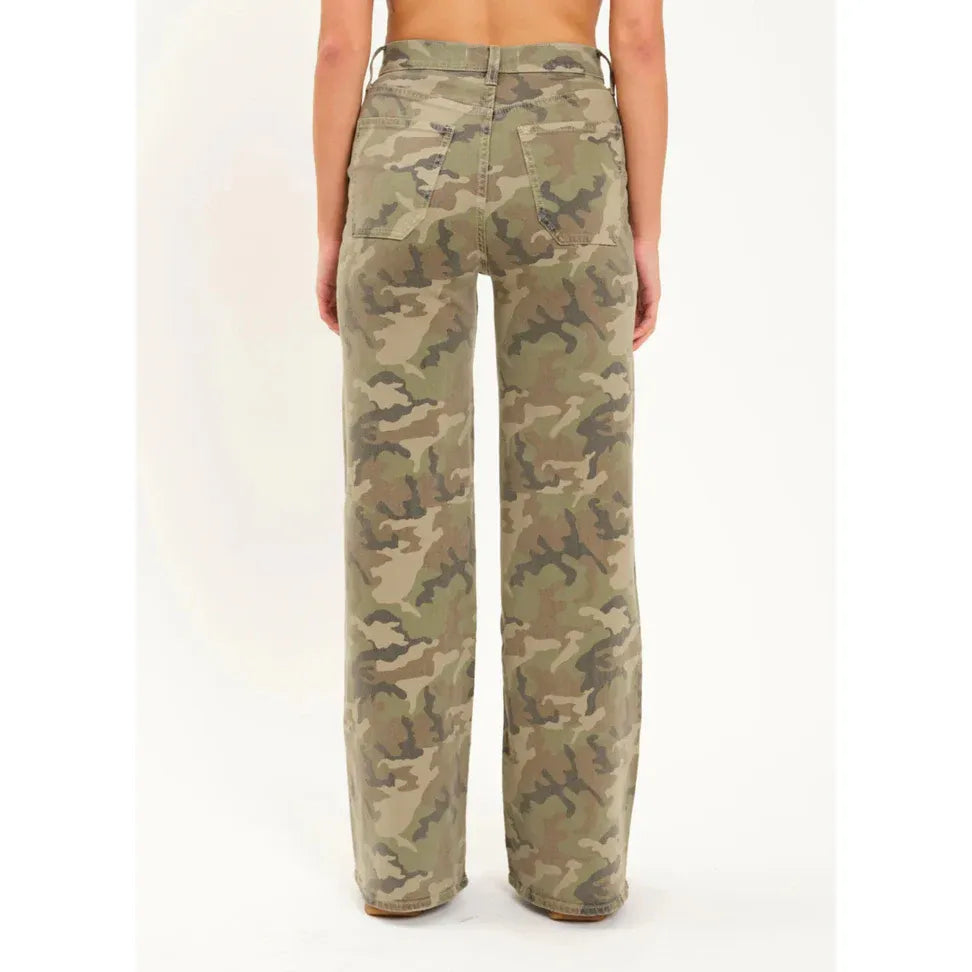 Daze Far Out High Rise Wide Leg in Hideaway camouflage pants worn with a white top.