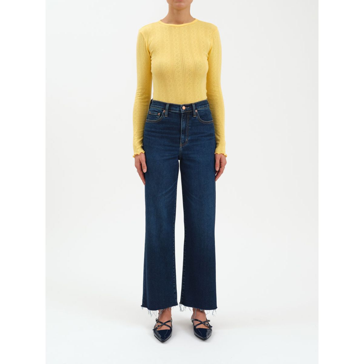 Daze Pleaser high-rise wide-leg ankle jeans in Magic Hour indigo Hug fabric on a model.