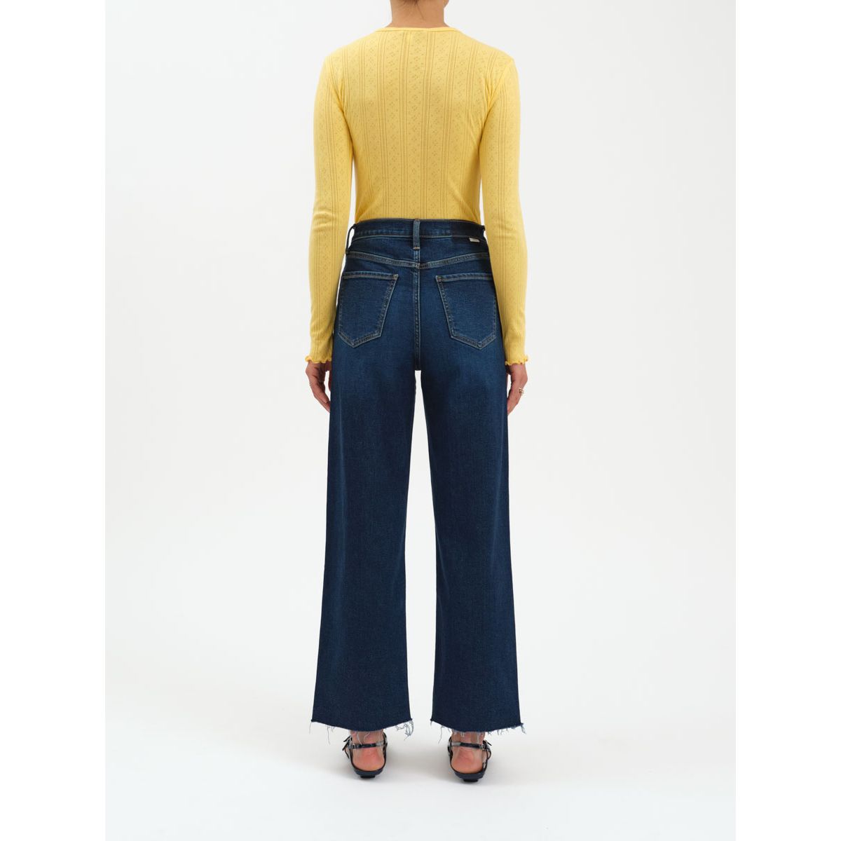 Back view of Daze Pleaser high-rise wide-leg ankle jeans in Magic Hour indigo.