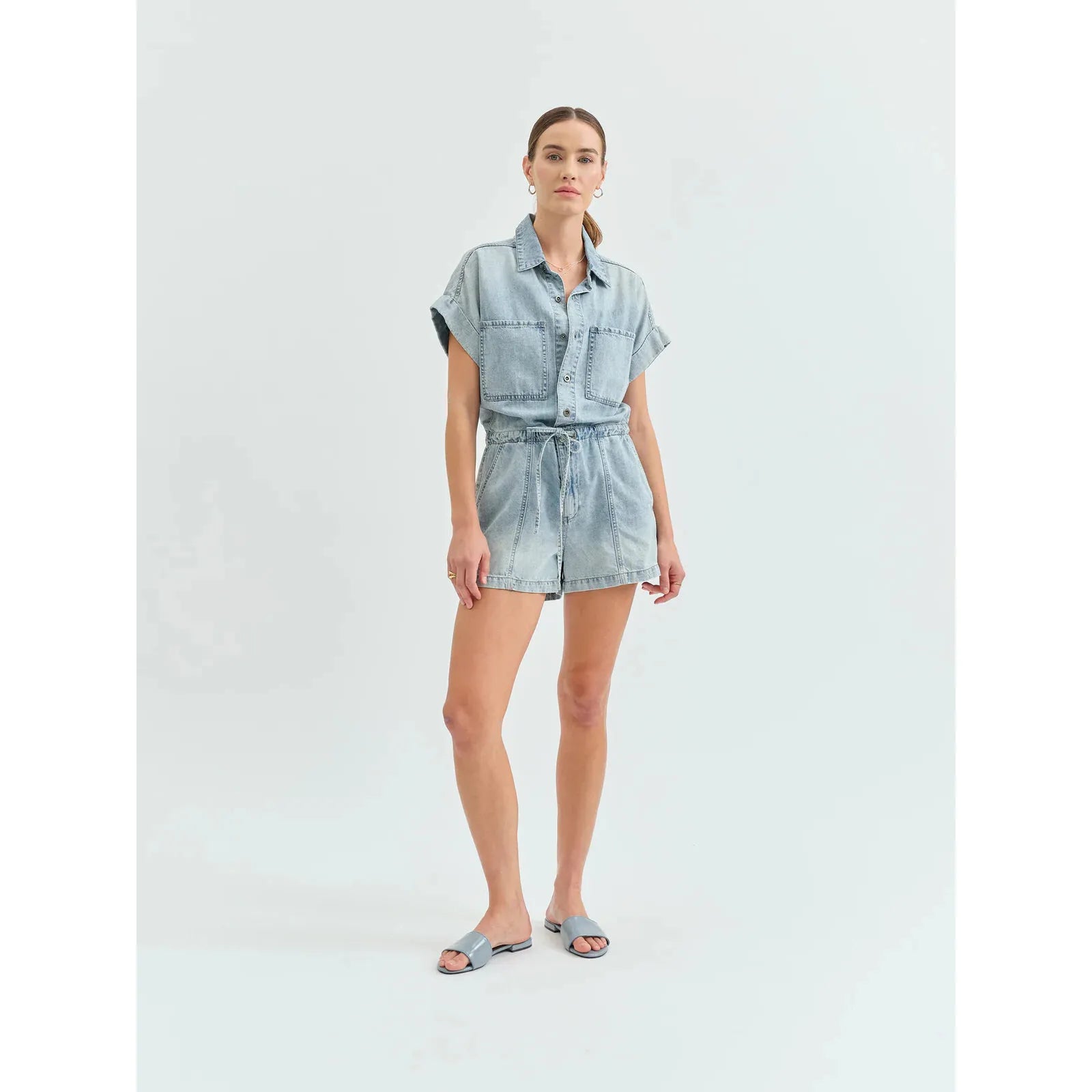 Effortlessly stylish, the Daze Surfside Romper in Wildcard features breathable denim for all-day comfort.