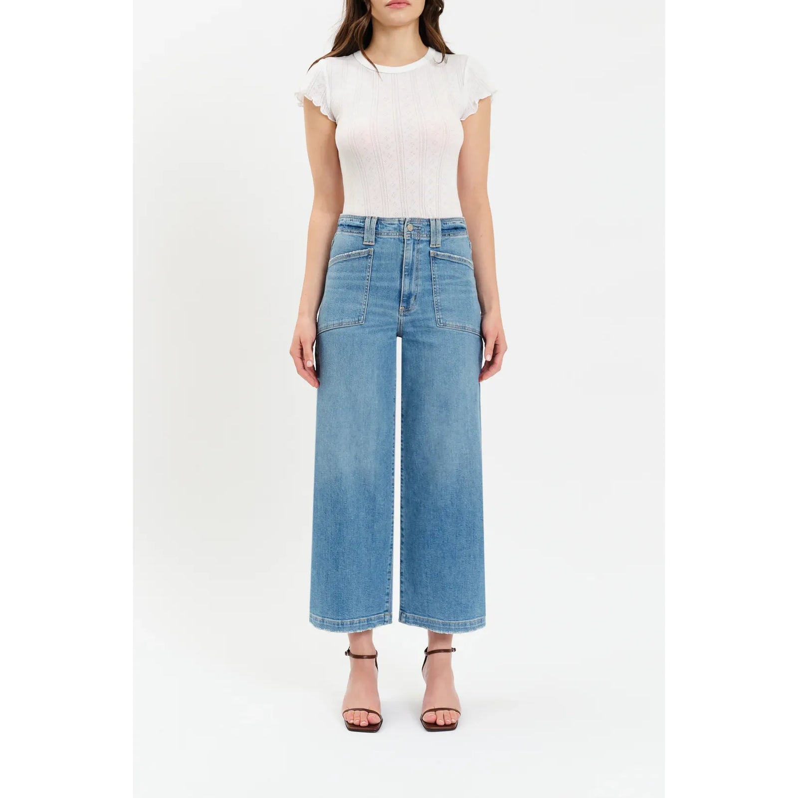 Daze Valley Girl Wide Leg Ankle in Fave denim jeans high-rise with retro-inspired patch pockets on a model.