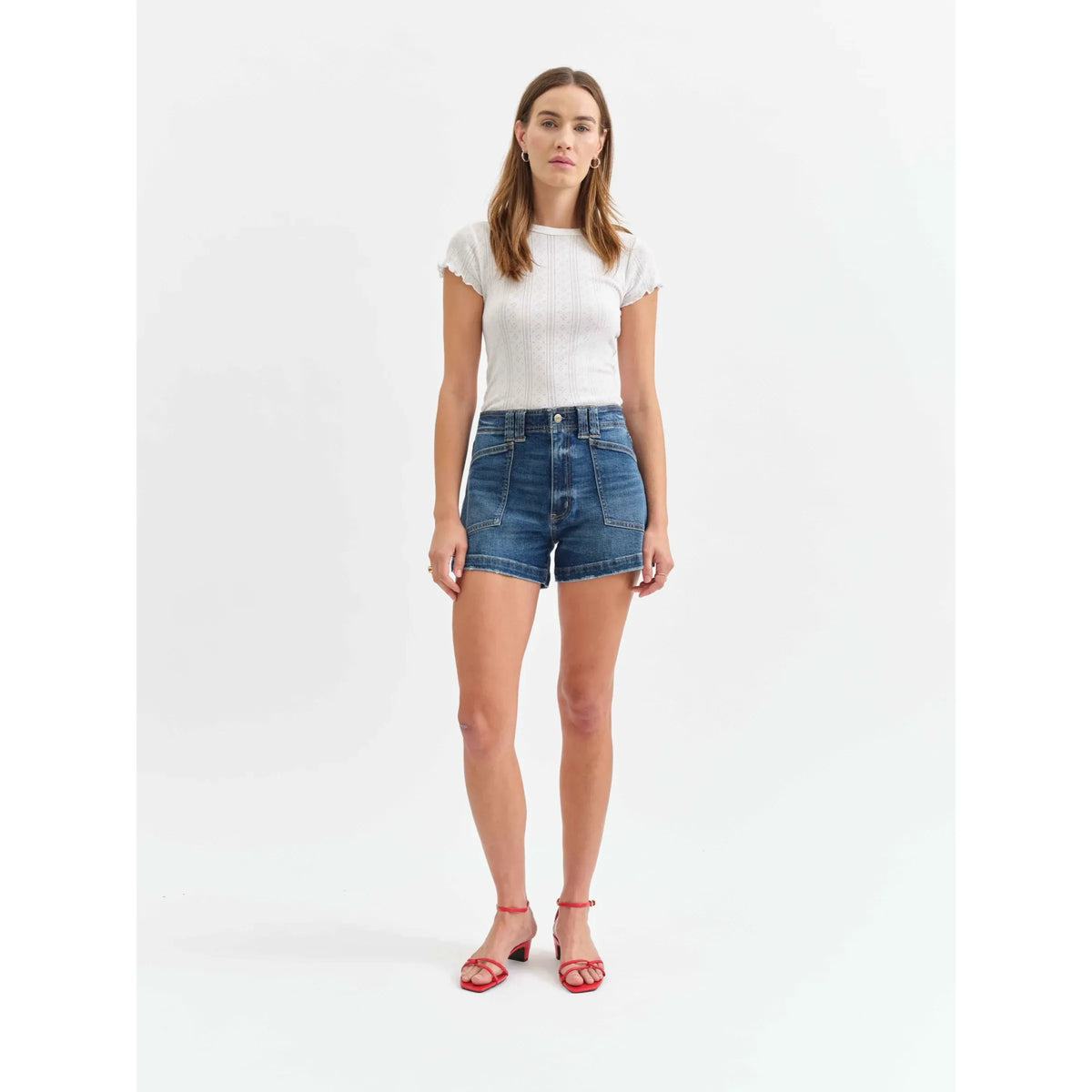 Daze Valley Girl Short in Manhattan: high-rise denim shorts with stitch-front pockets, model in white top.