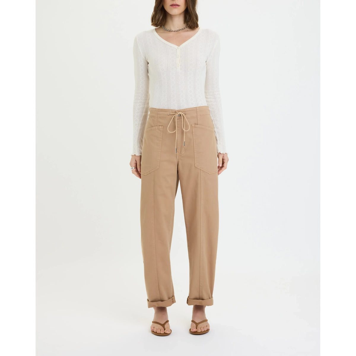 Daze Villa Drawstring Barrel Pant in Latte on model with drawstring waist and tapered silhouette.