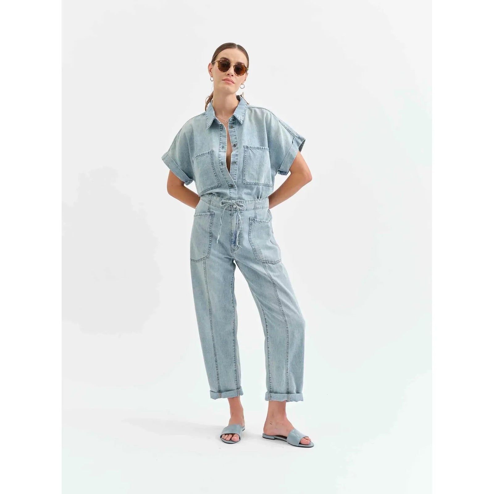Daze Villa Drawstring Jumpsuit in Wildcard offers chic style with an adjustable fit and wide-leg design, perfect for summer.