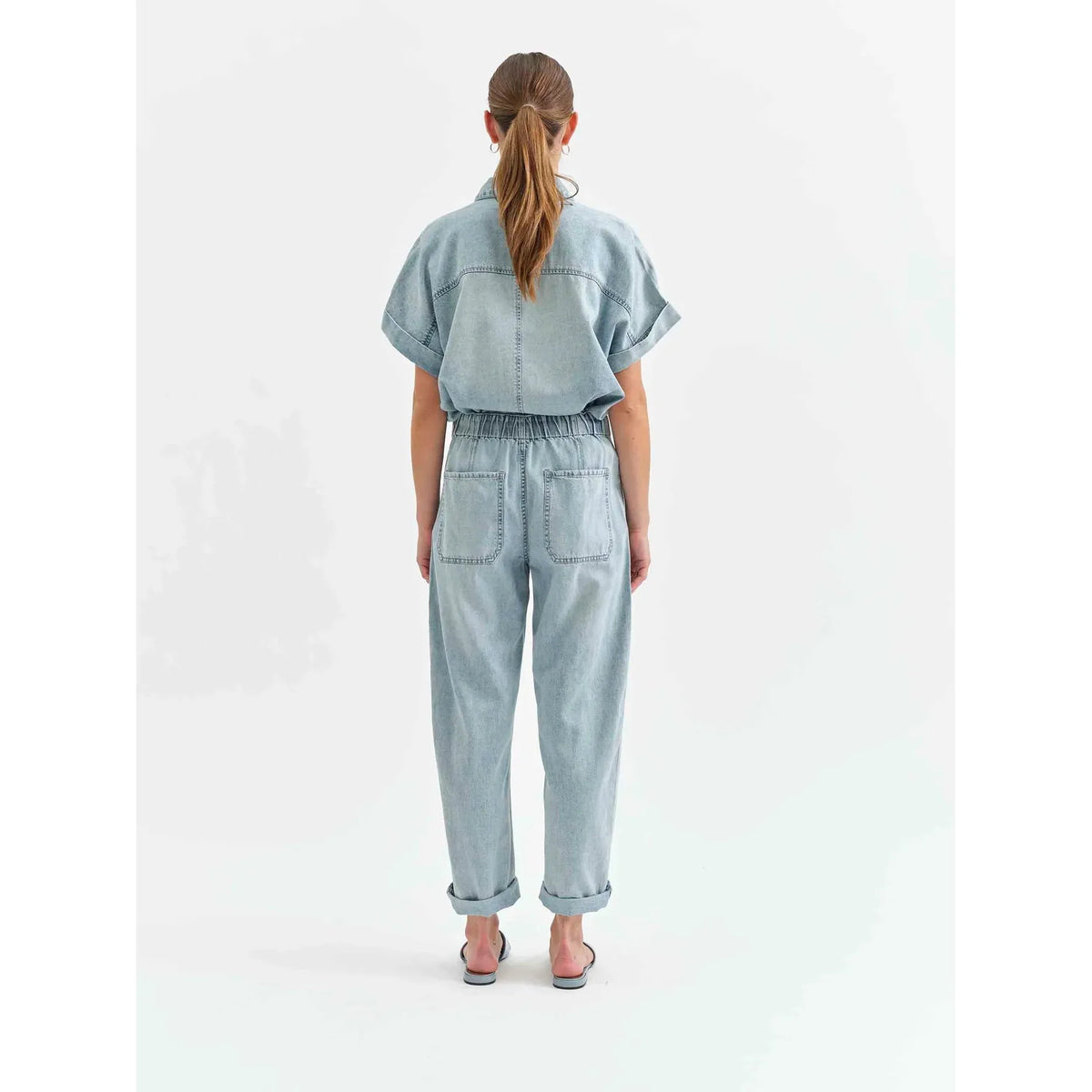 Daze Villa Drawstring Jumpsuit in Wildcard offers chic style with a wide leg and adjustable waist for perfect summer wear.