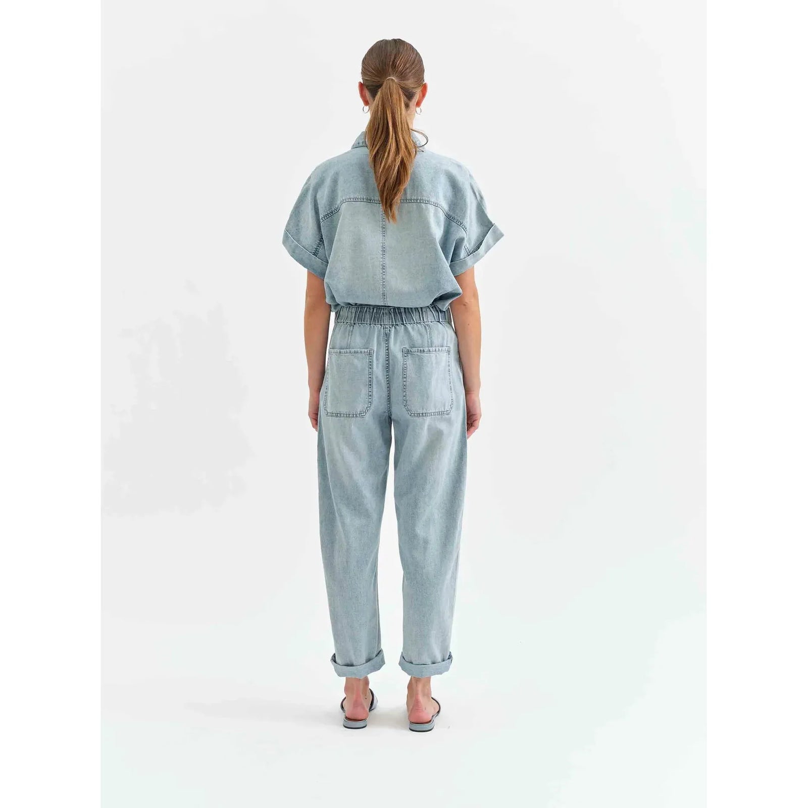 Daze Villa Drawstring Jumpsuit in Wildcard offers chic style with a wide leg and adjustable waist for perfect summer wear.