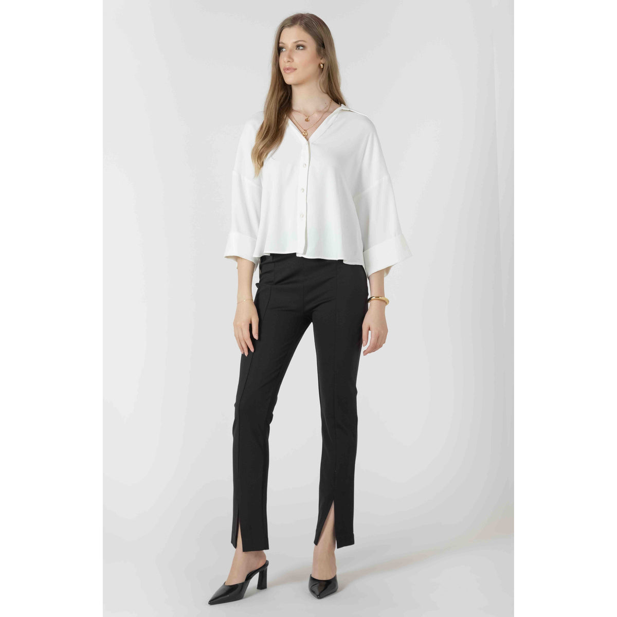 White Dex Black Tape Cuffed Button Front Shirt worn by a model; button-front top with wide cuffed sleeves.