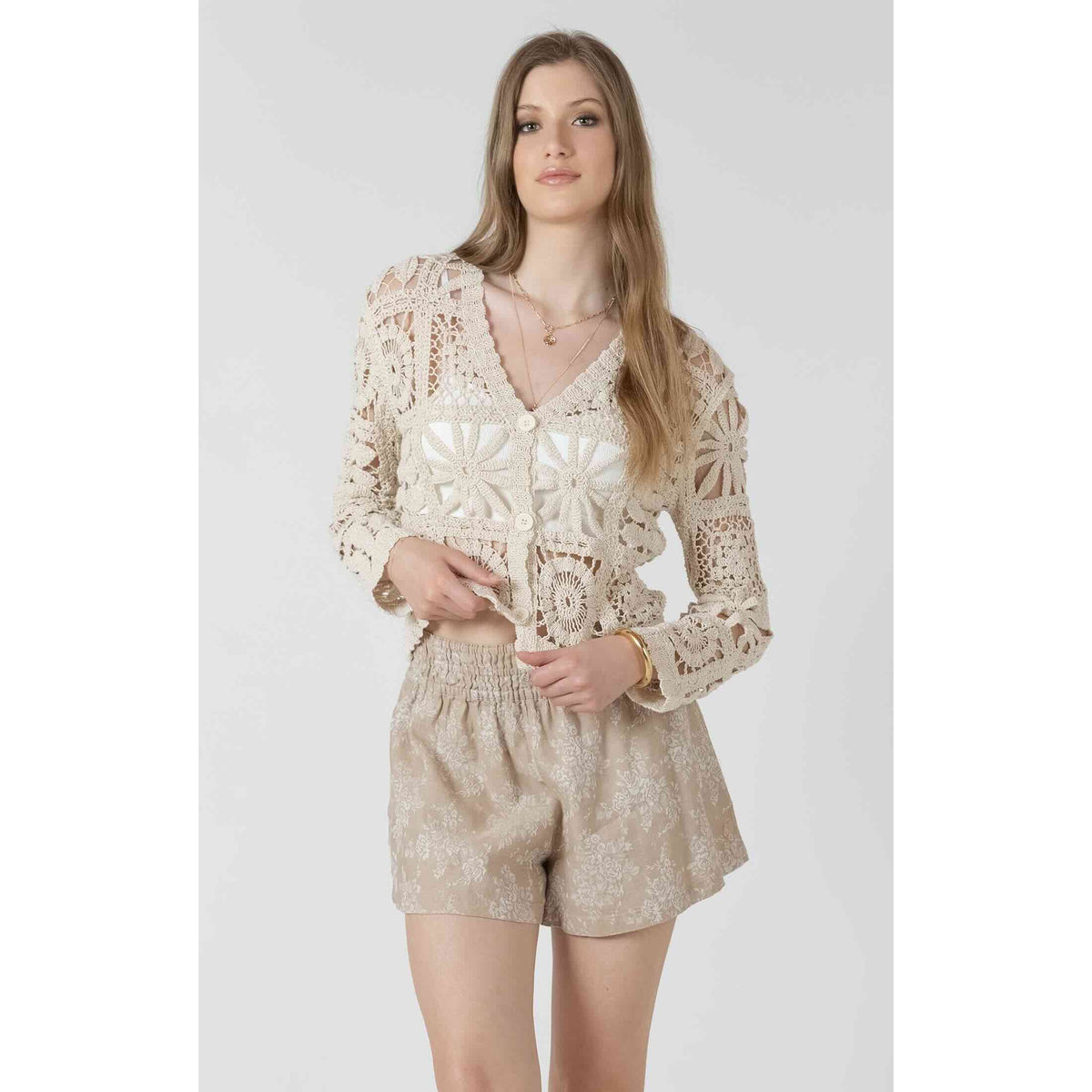 Dex Black Tape Embroided Square Pattern Cardigan in cream crochet fabric with floral square motifs.