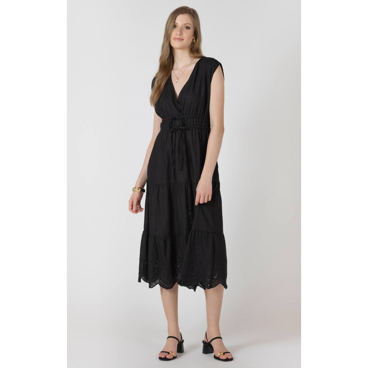 Dex Black Tape Eyelet Dress, a black-wash woven midi with architectural tape eyelet detailing and waist tie.